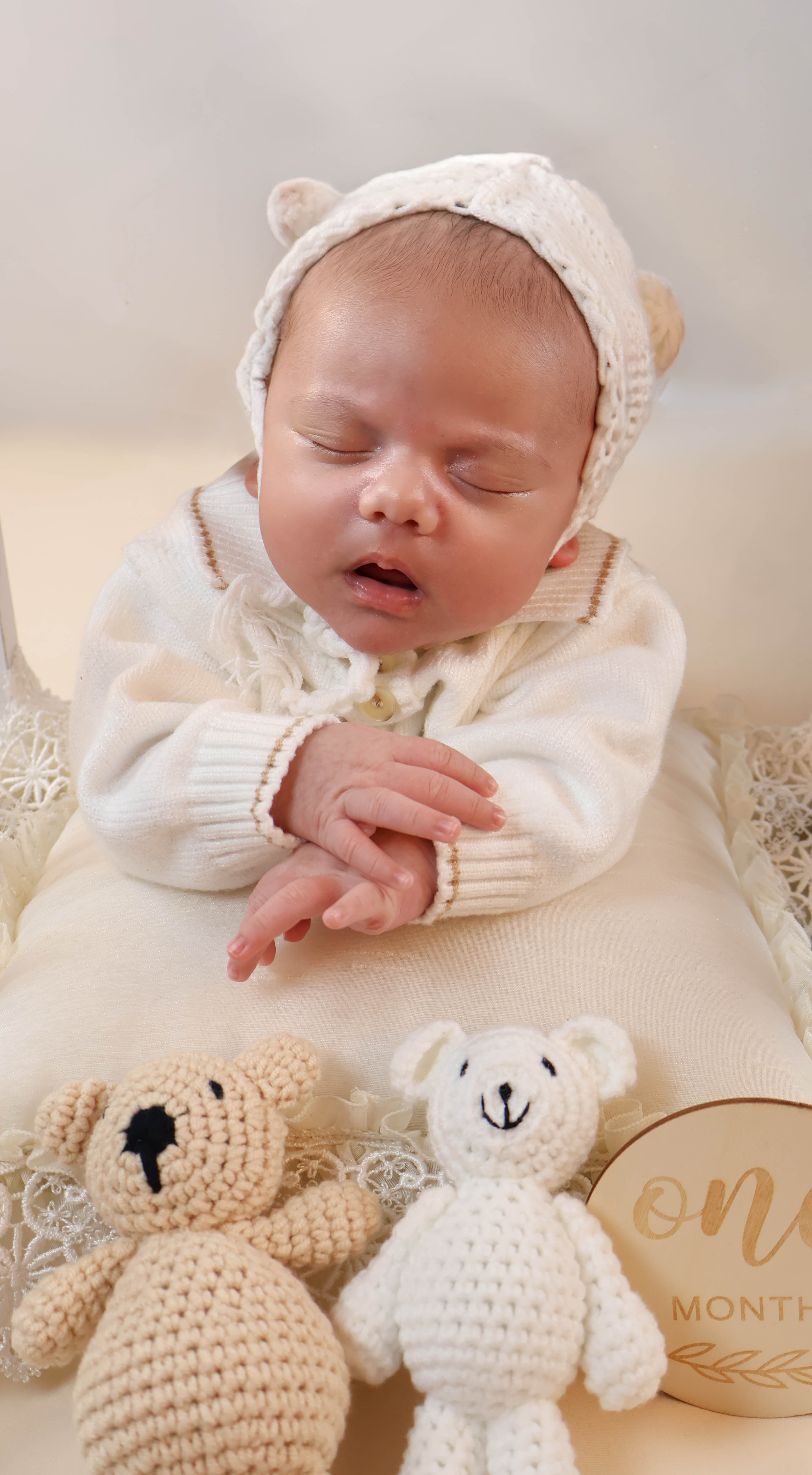 A couple stands outdoors at sunset.