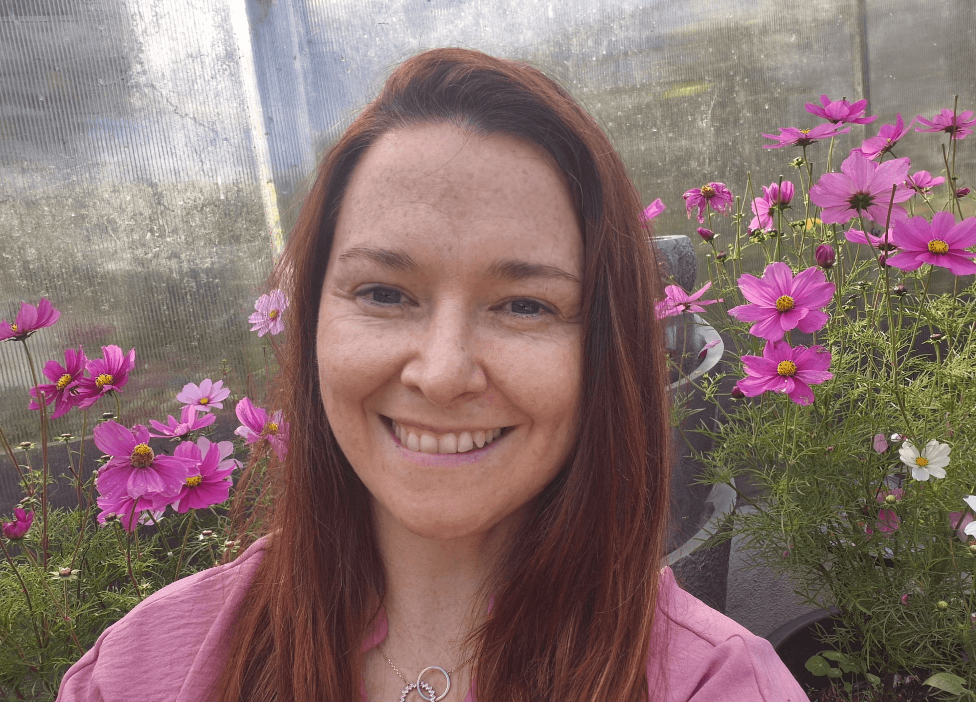photo of Jane Reilly with Flowers in the background