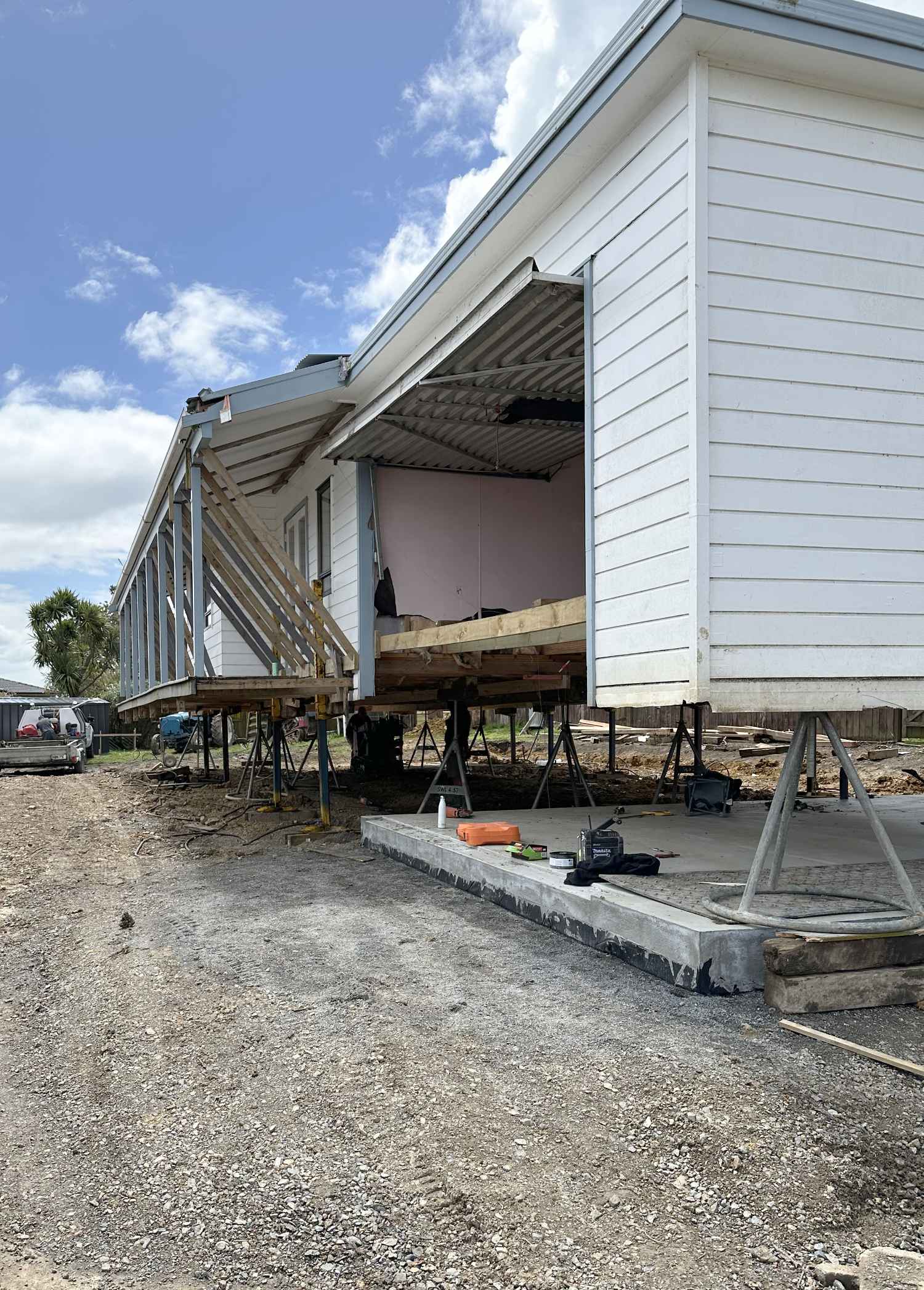 Moving the relocatable home ready for its renovation, Maraetai, East Auckland builders