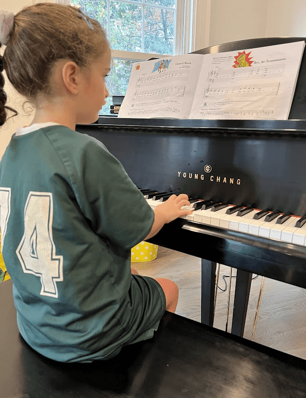 student playing piano