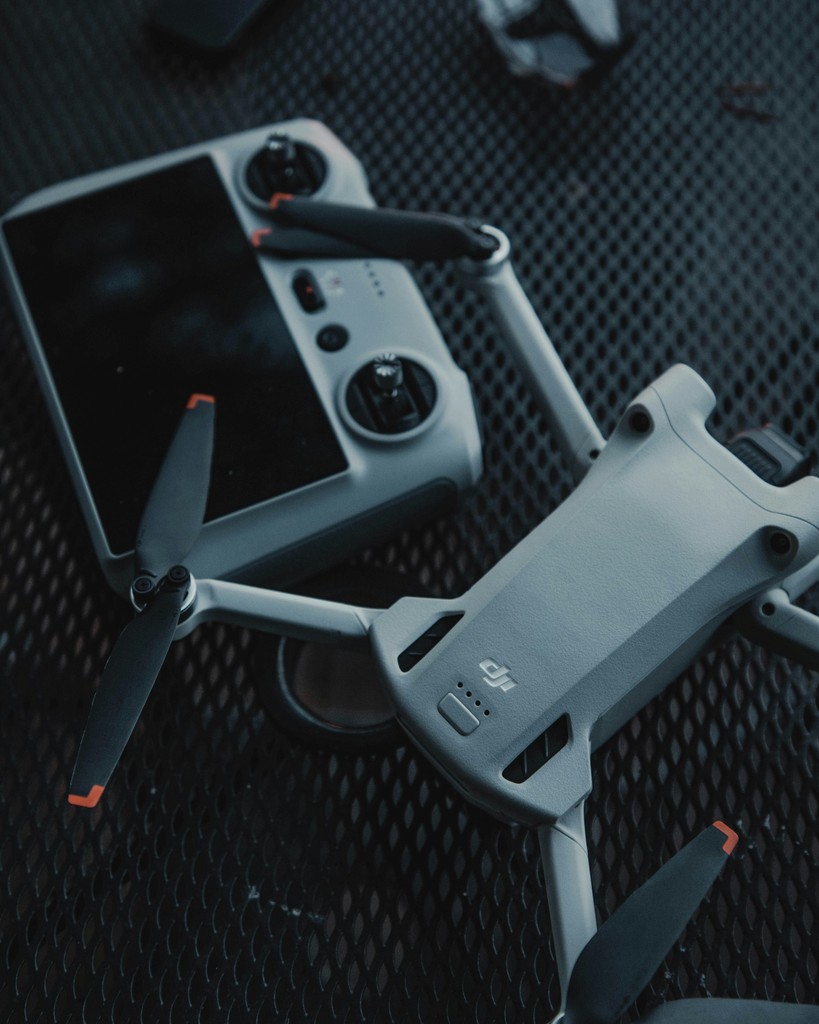 a remote control device sitting on top of a table