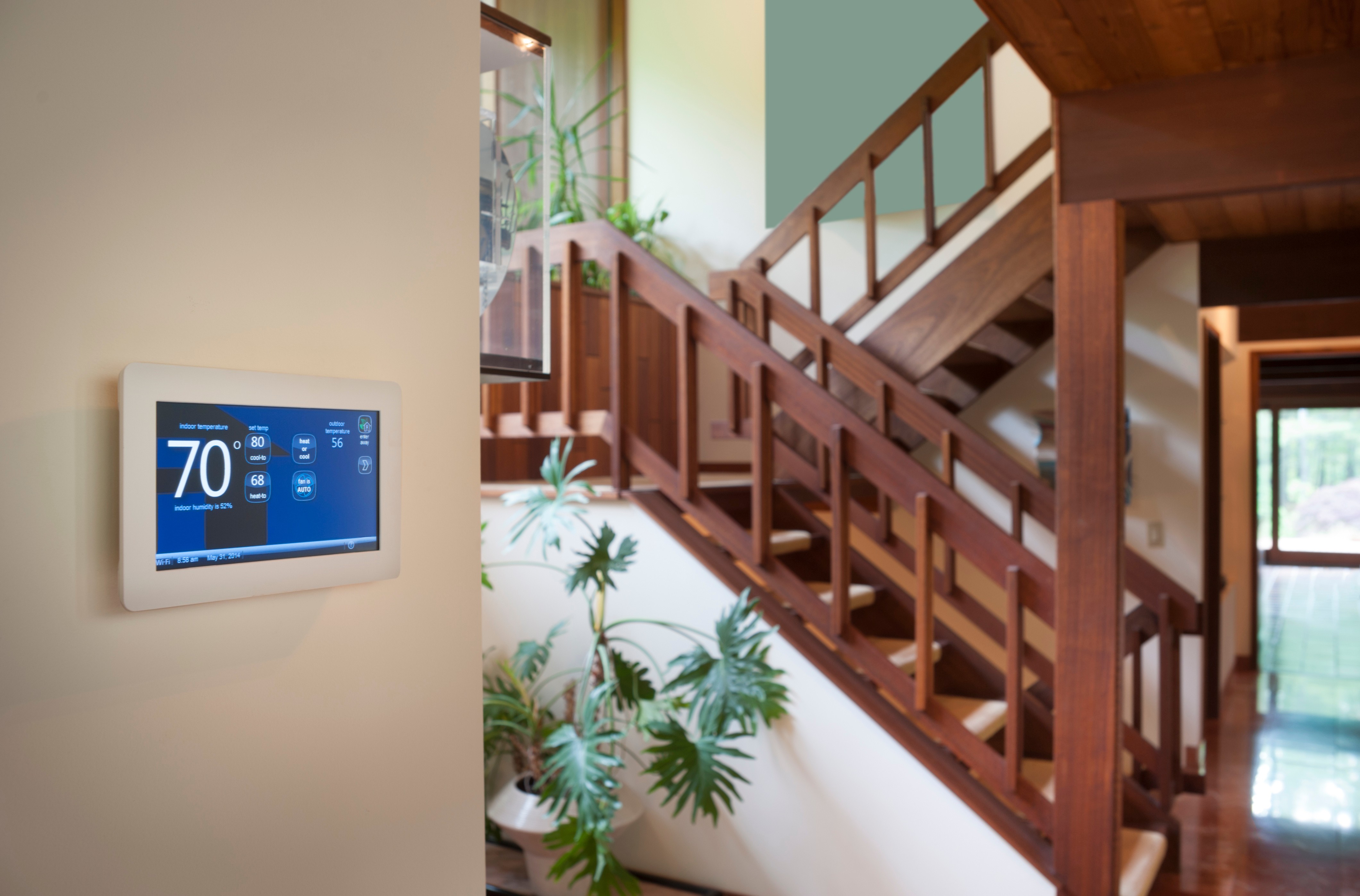 A smart thermostat in a home