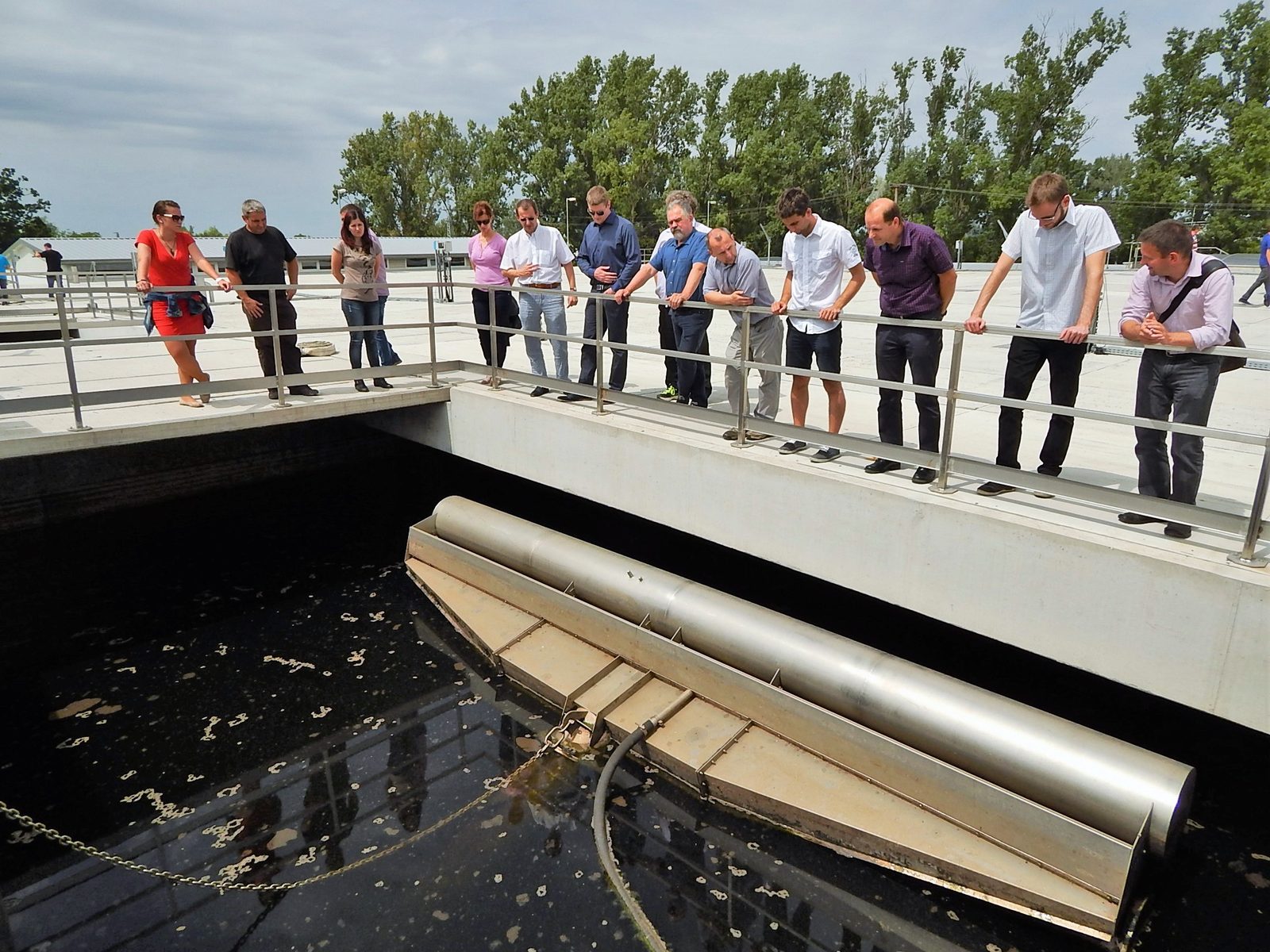 Visitors watching the BIODEC S 400 decanter in a CYCLATOR basin at the Szentes wastewater treatment plant, Hungary