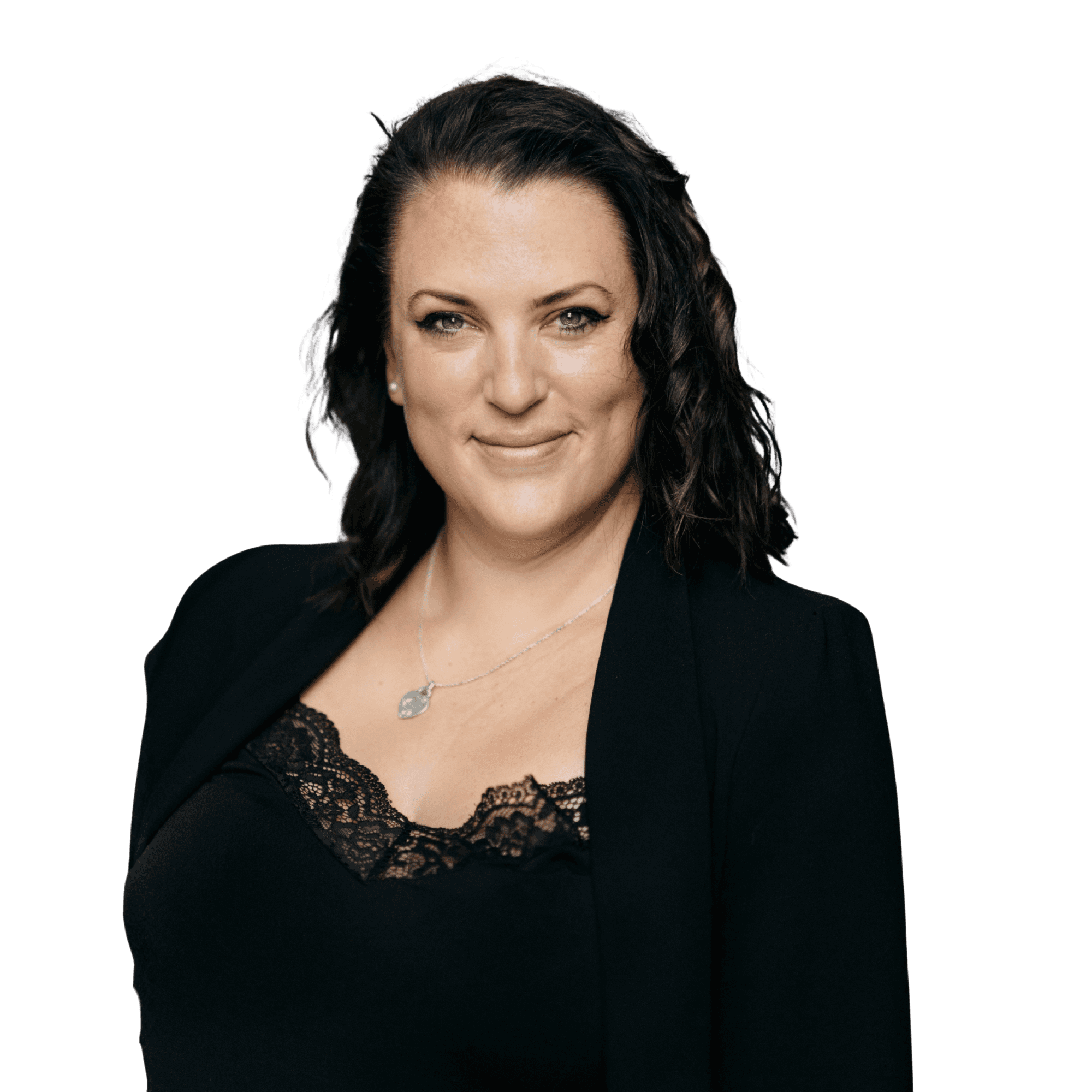 Close-up of a tree stump showing growth rings and a textured brown wood surface.