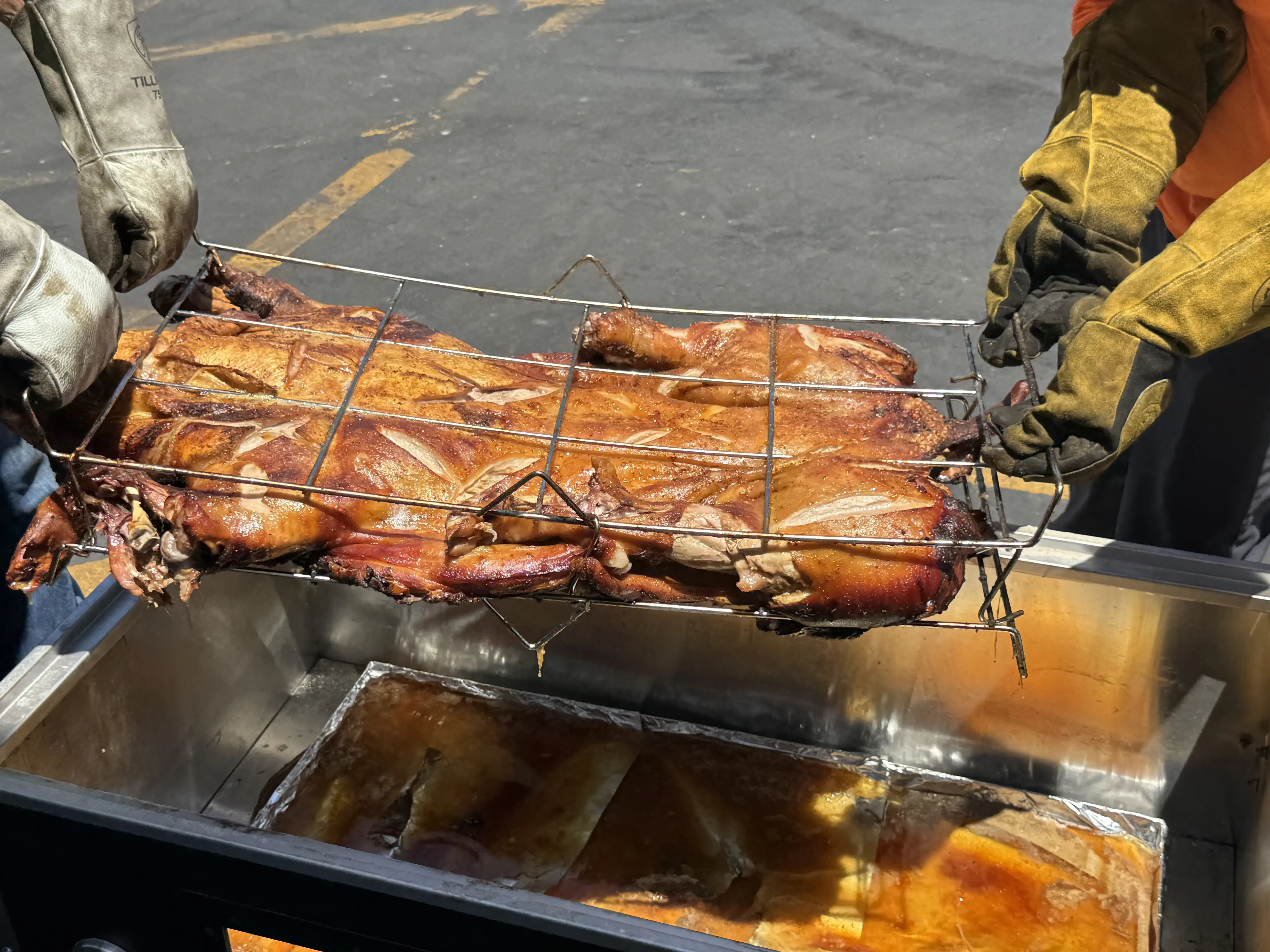 whole hog barbeque pulled pork spit roasting