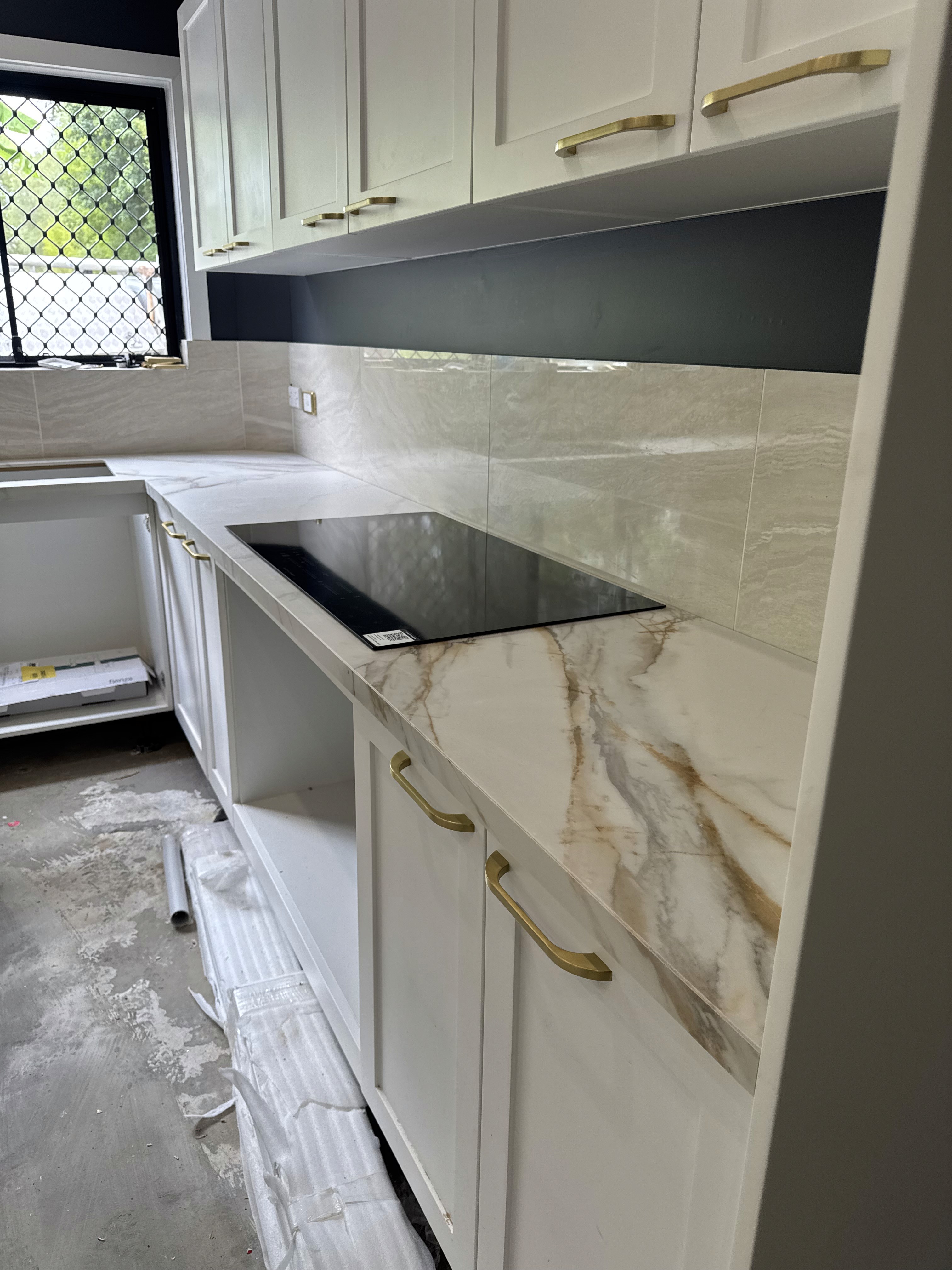 Babylon quartz L-shaped kitchen island in Mount Tamborine