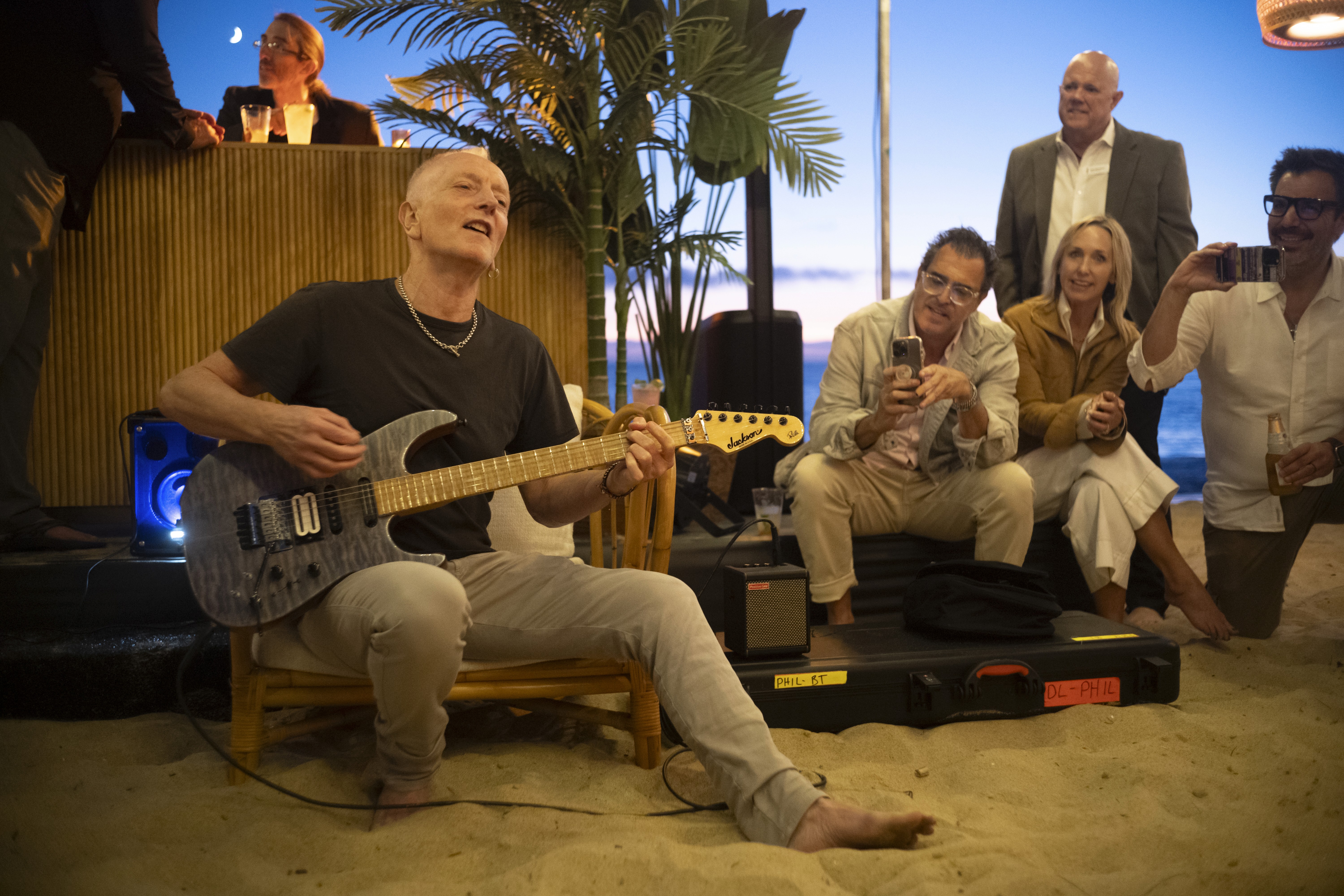 boulders in sea during golden hour