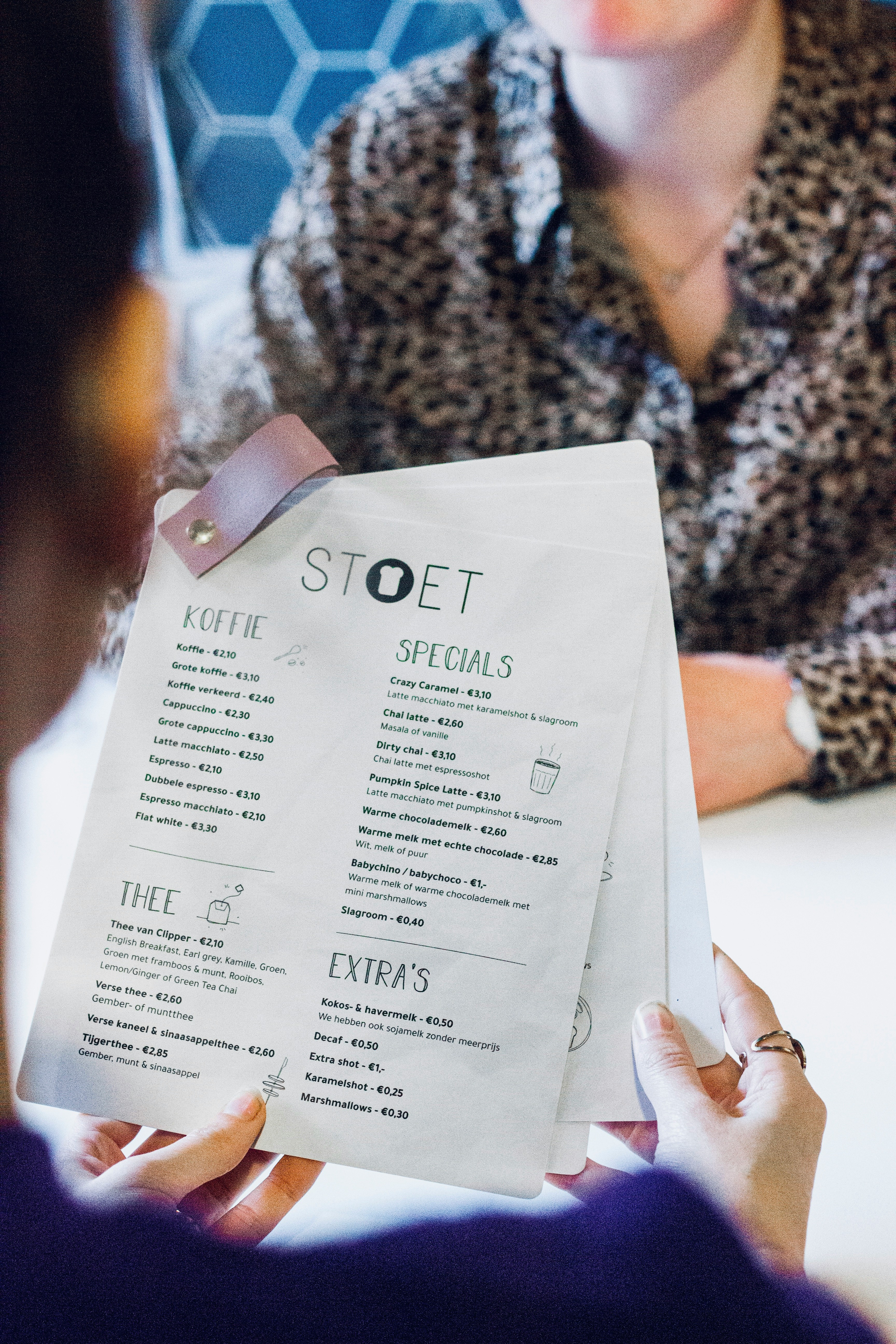 person holding white printer paper