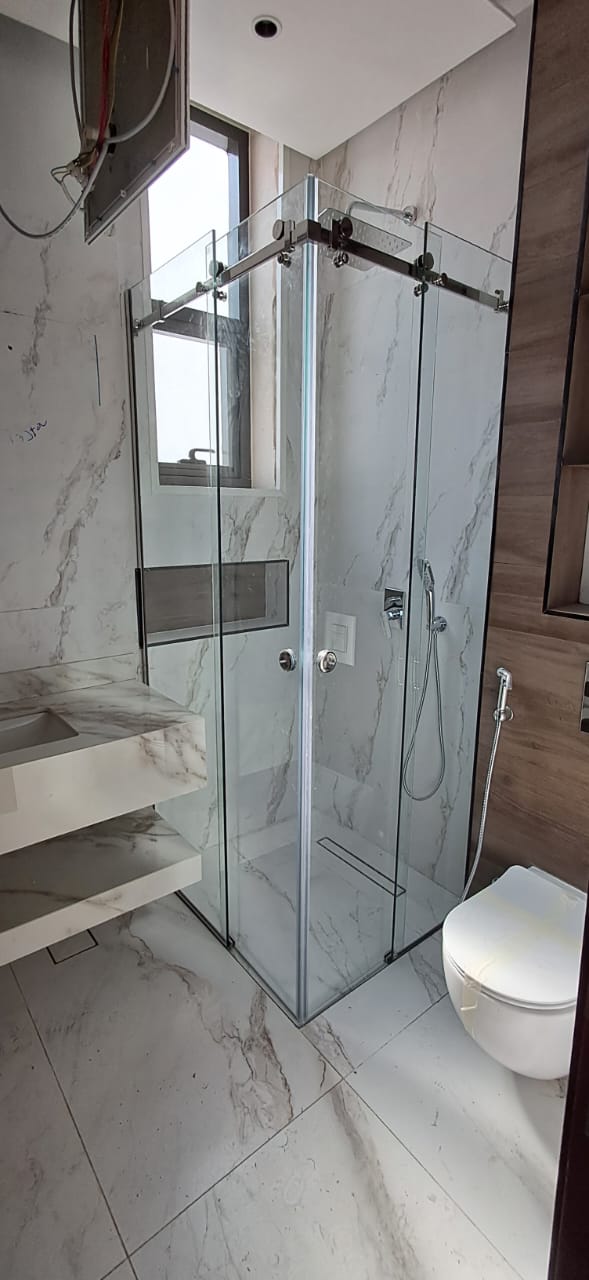 husband and wife working happily on a laptop