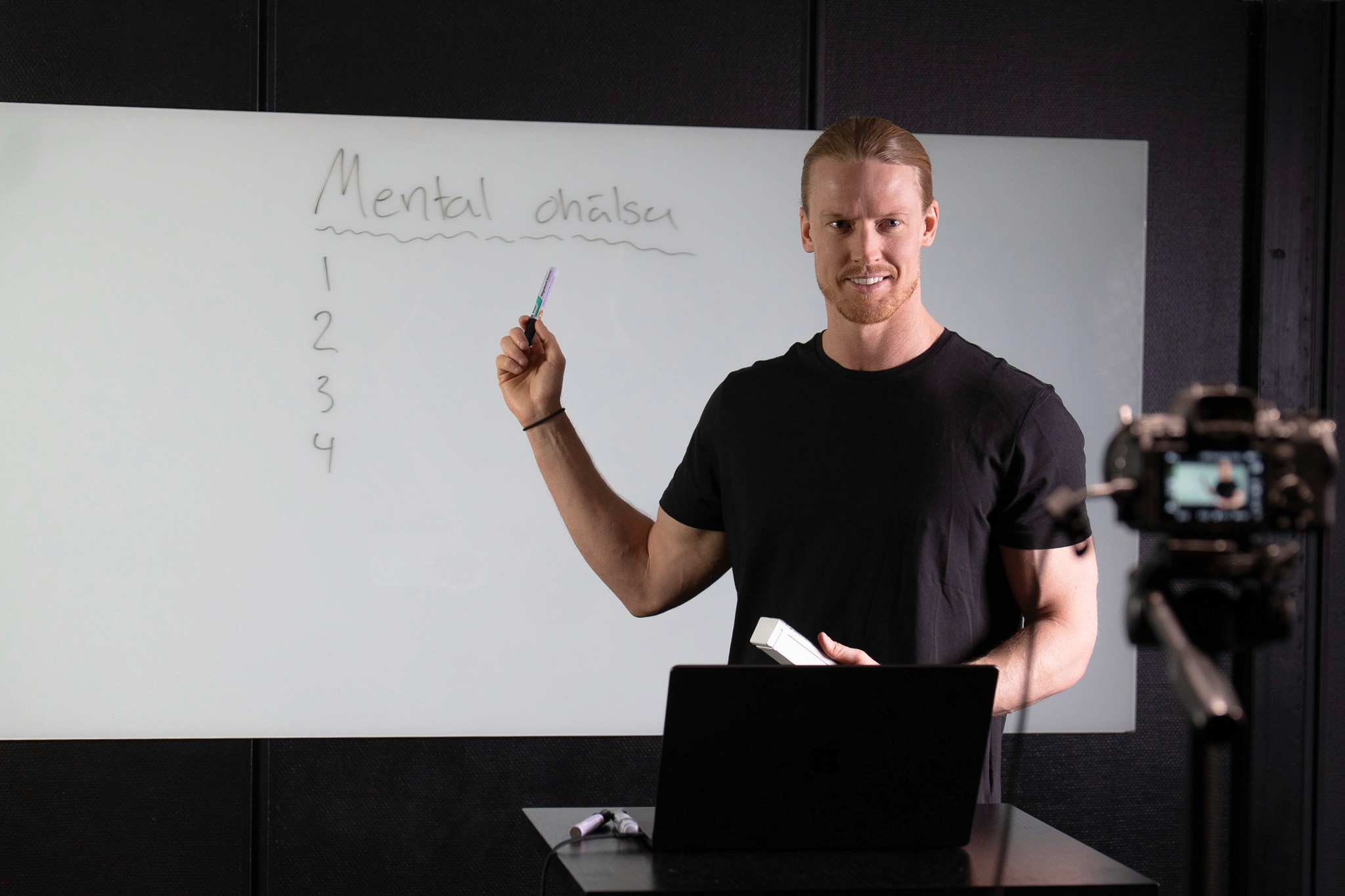A fashion model in black dress