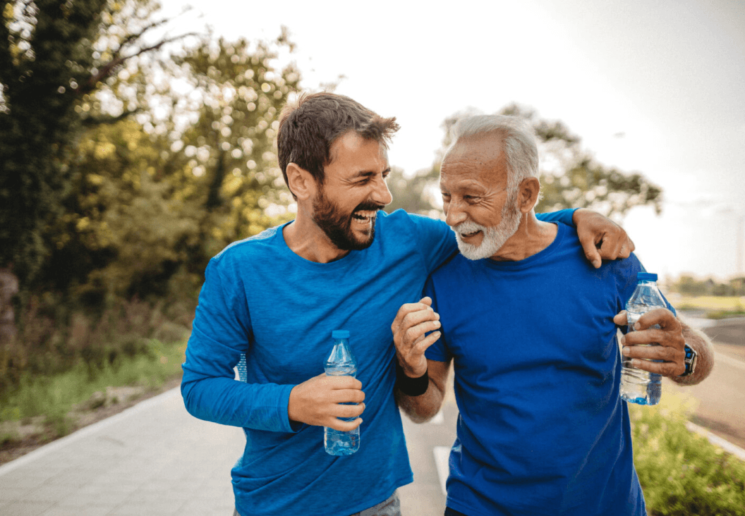 two men jogging outdoors representing healthy lifestyle and weight loss