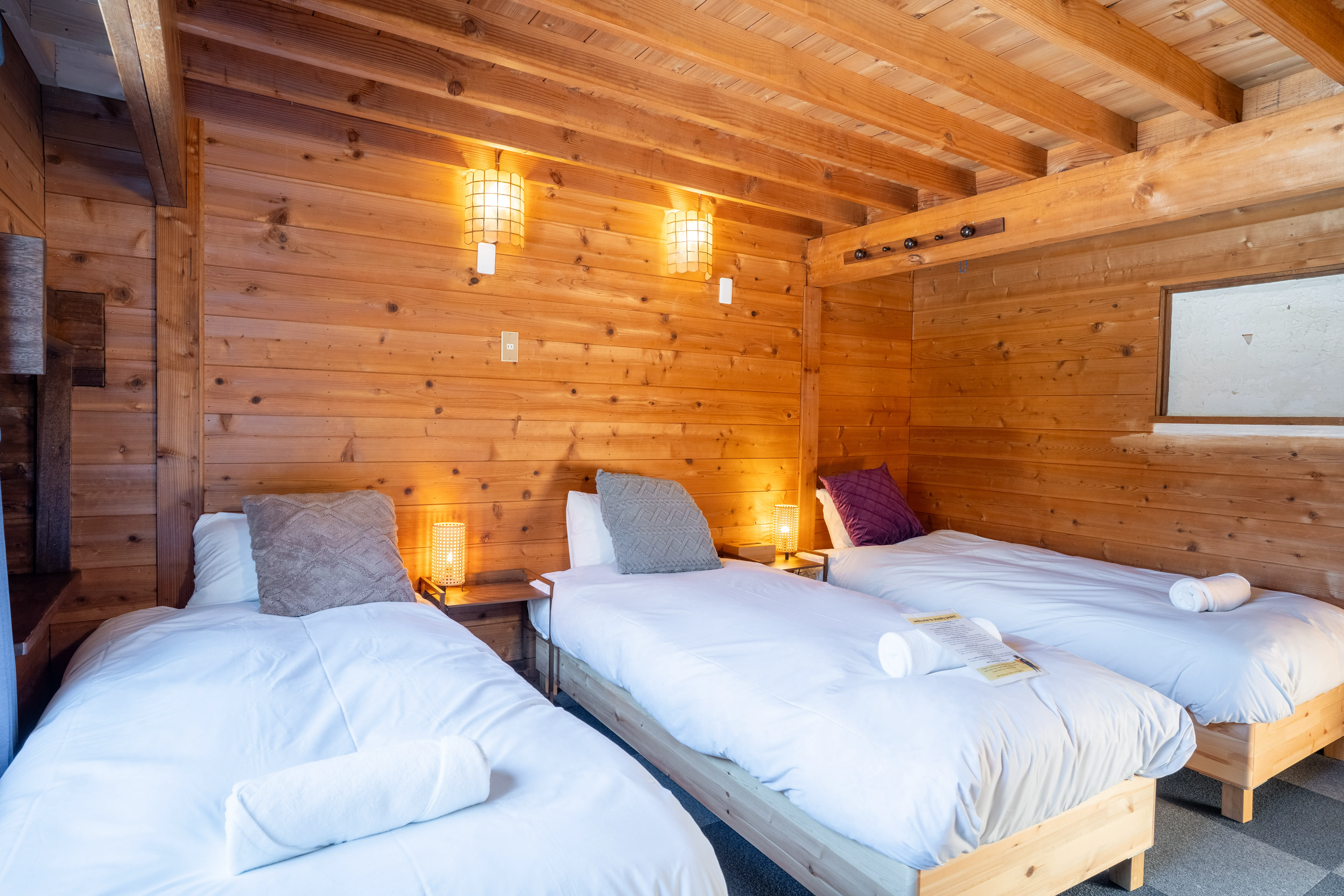 Quad room interior at Sneaky Peaks, Hakuba