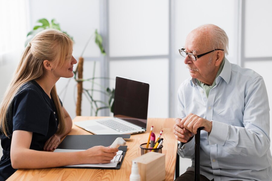 A patient having his checkup and to get his reports.