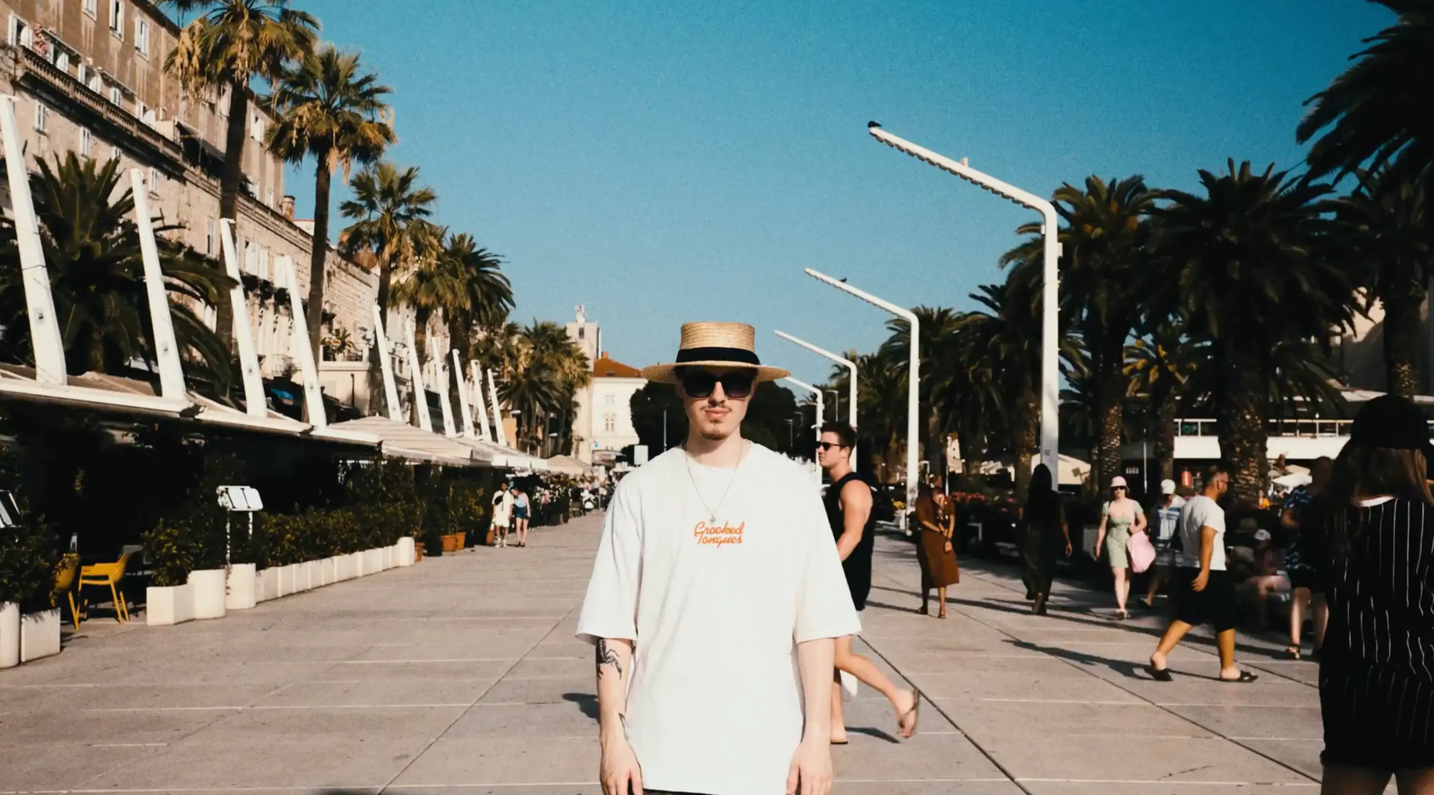 A man looking toward the camera in a street