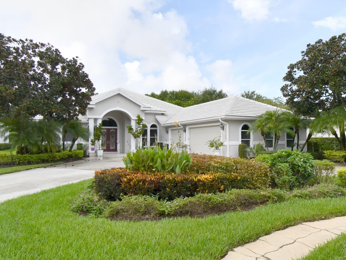 2002 Original Roof in Calloway Place, PGA Village, Port St Lucie with Entegra Flat Smooth Tile in Natural Gray