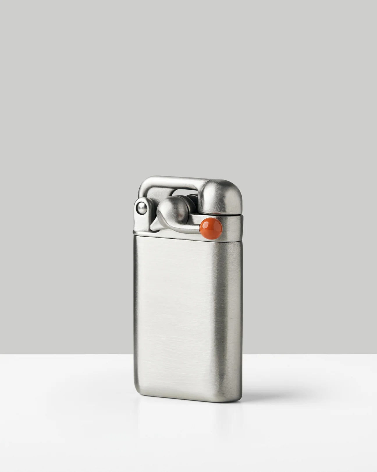 Craighill Swingtop lighter in stainless steel, swing arm with an orange ceramic ball on top