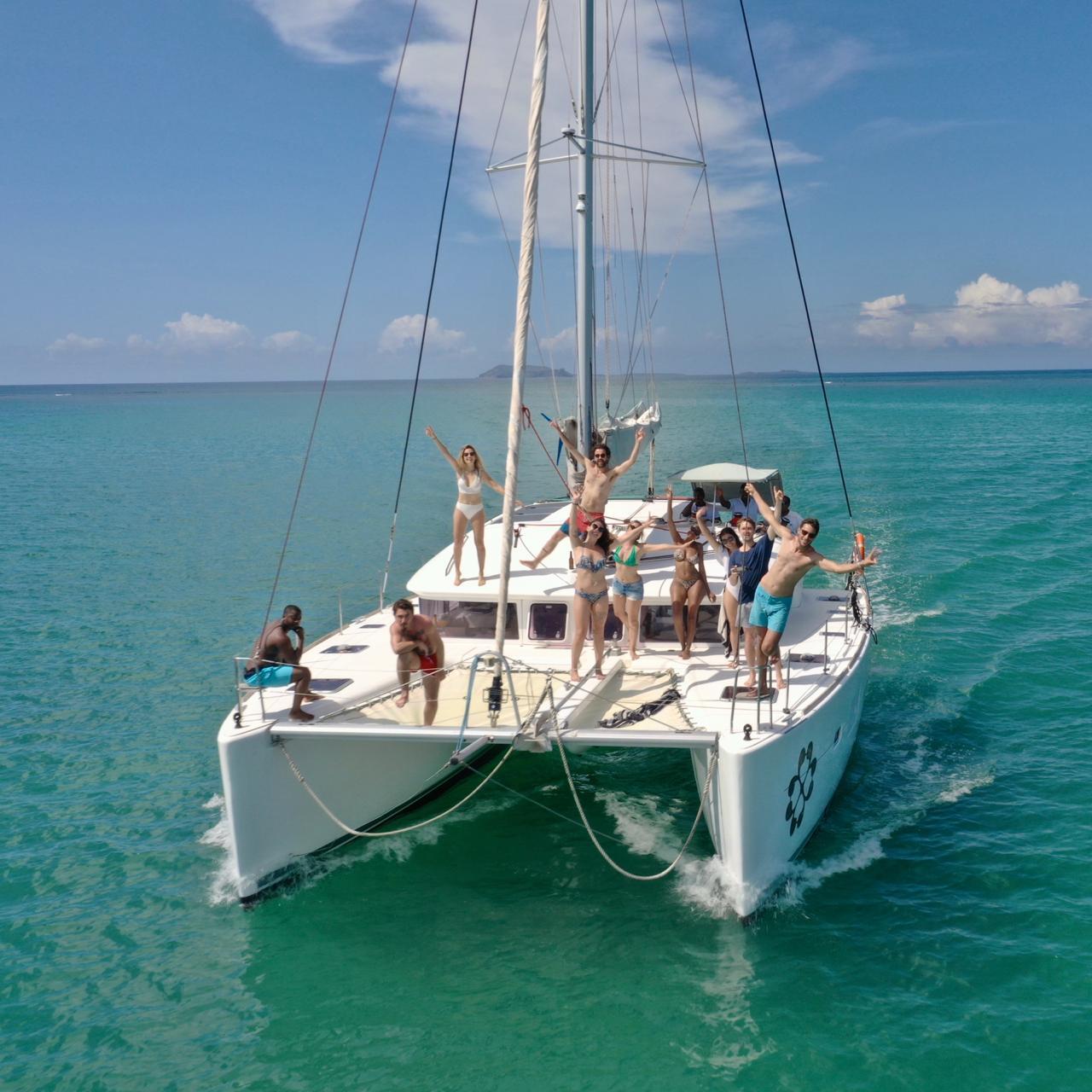 A thoughtful young person with dark hair gazes to the side, captured in soft black and white lighting.