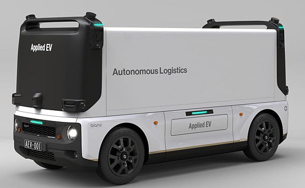 A futuristic self-driving delivery truck, emblazoned with Suzuki’s logo, cruising autonomously on a busy highway with logistics hubs in the background. 