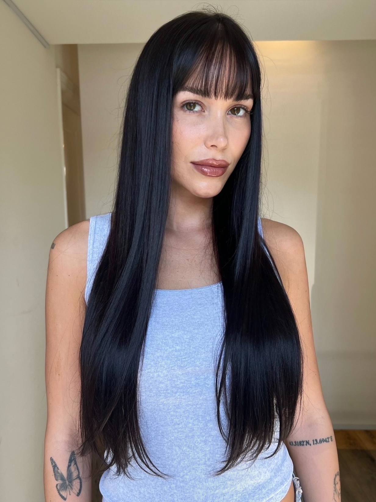 Espresso brunette with non-toxic smoothing treatment at Bomane Salon – sleek, shiny hair with fringe by Jenn Montoya Palmore.