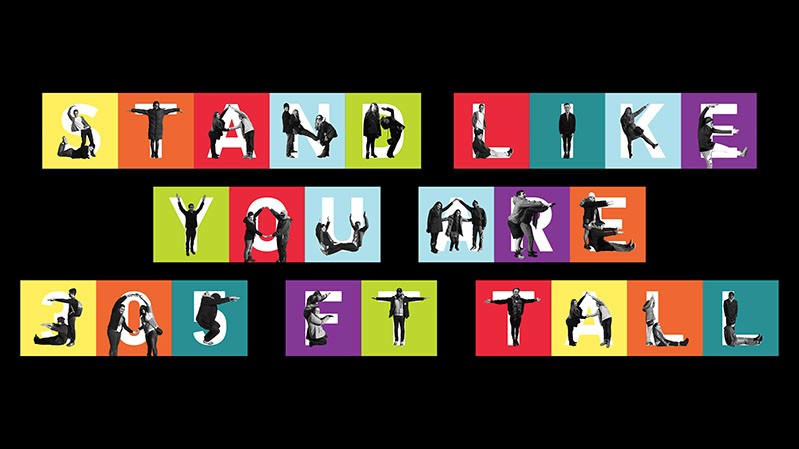 A picture of multiple colored squares with letters and humanoid figures in them. There is a text that may spell: Stand Like You Are 305 FT tall.