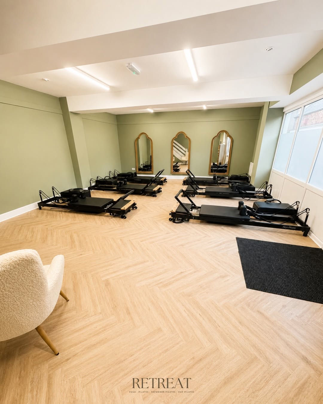 Reformer Pilates class led by Rise and Reform instructor.