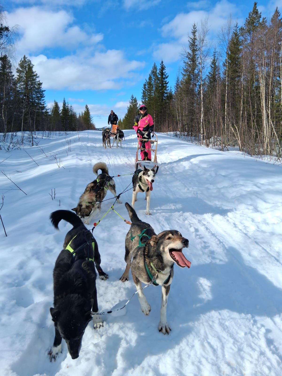 man riding black atv on brown sand during daytime