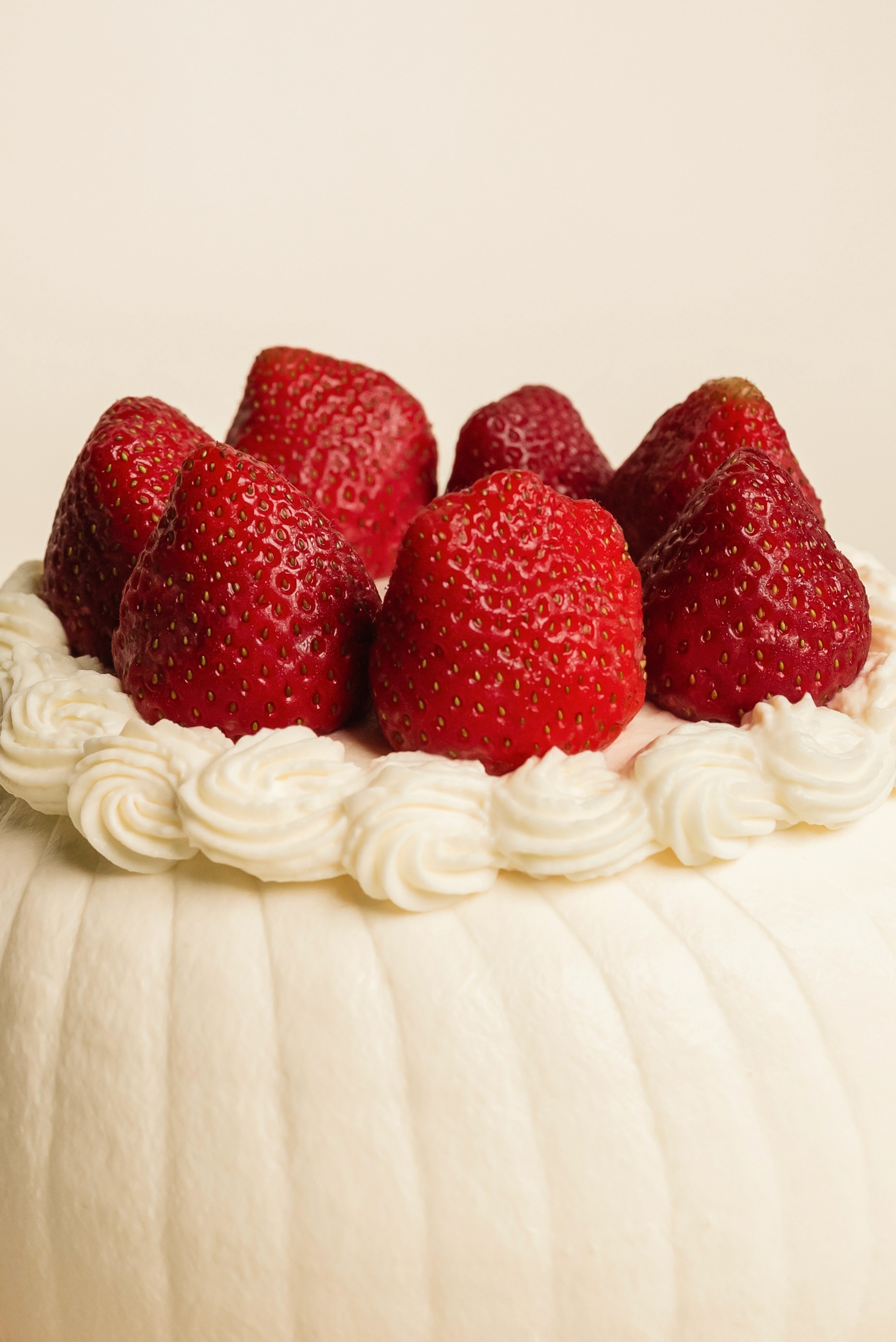 Spilled green smoothie with straw