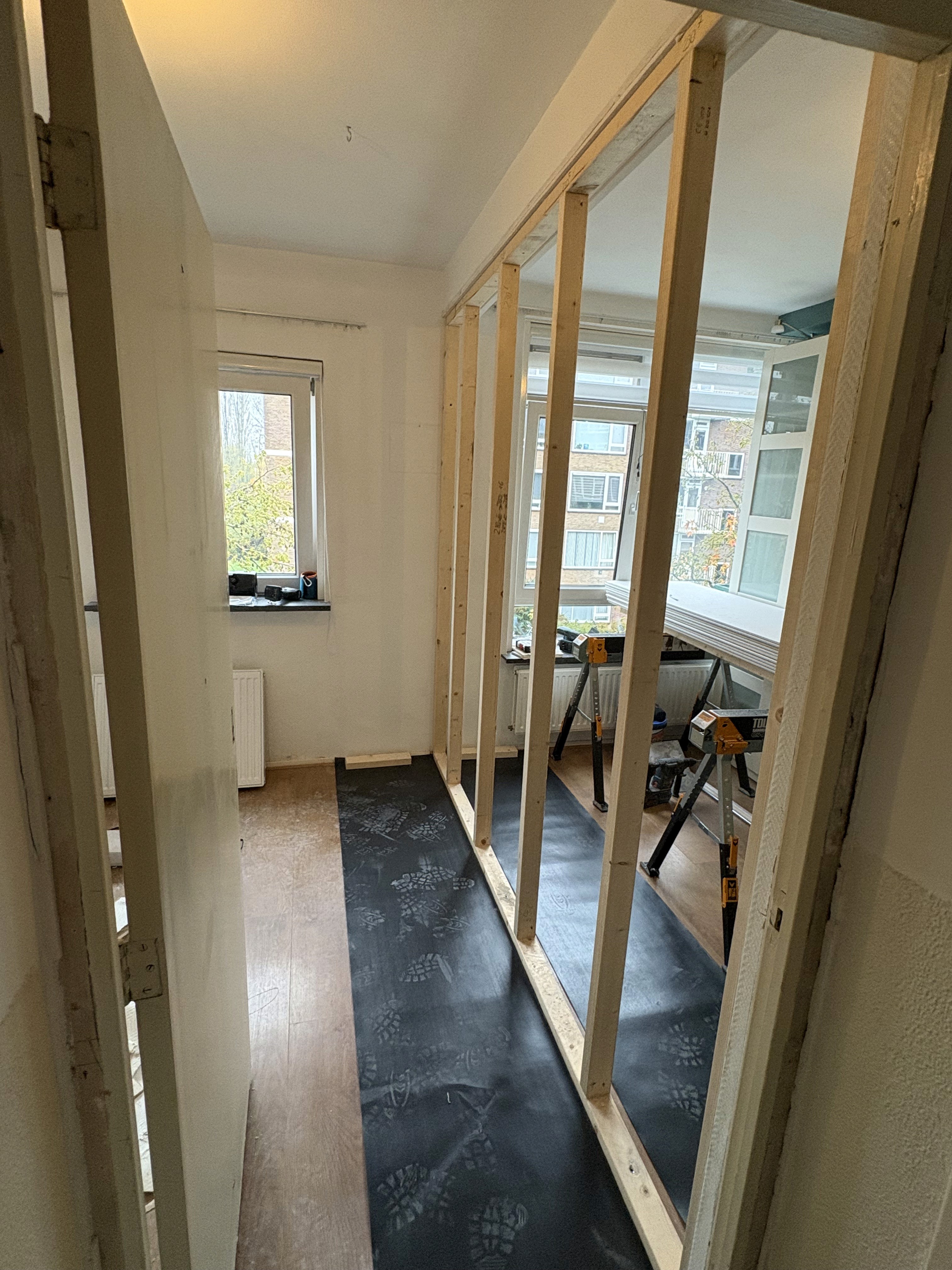 two people looking at a tablet and smiling