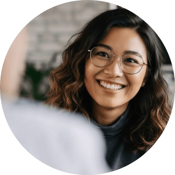 Girl smiling with coffee mug