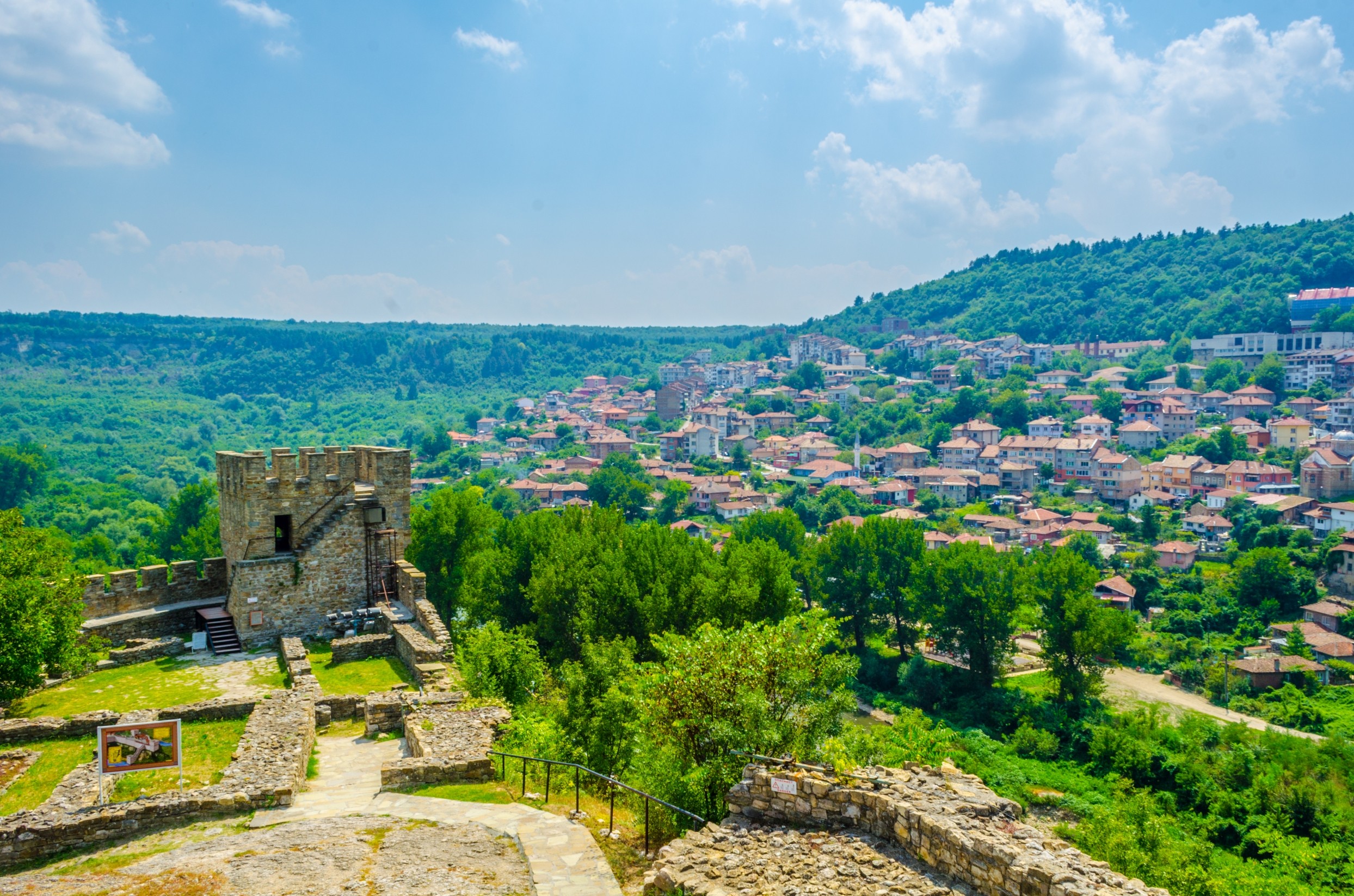 Group of men standing with Sufboard