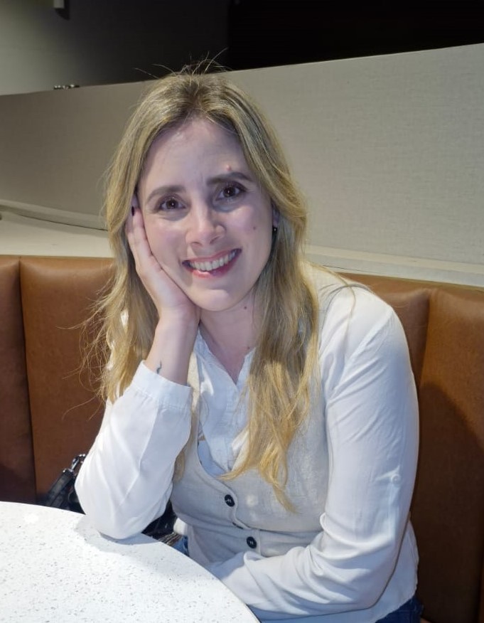 A young girl smiling