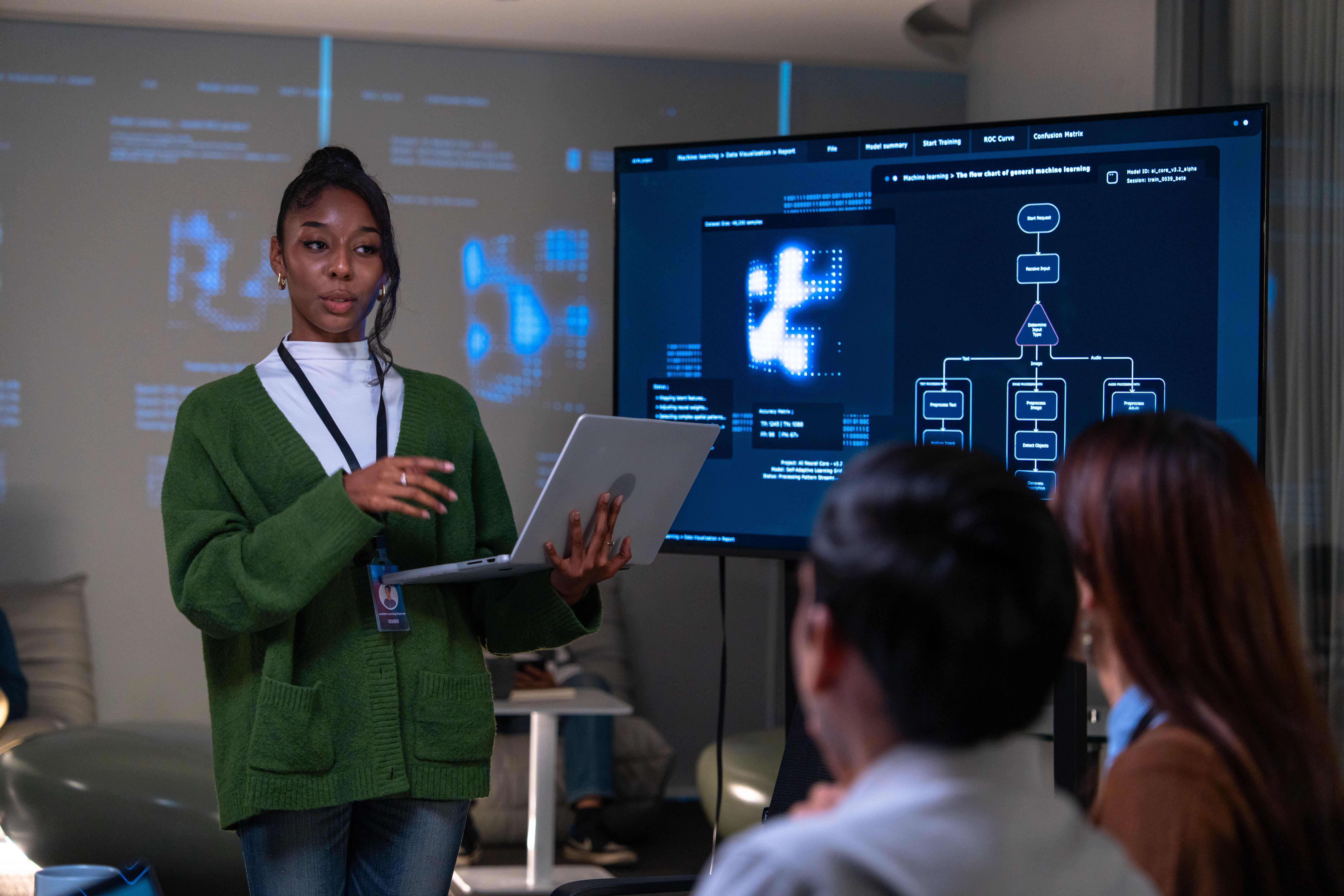 Two Men Using Laptop