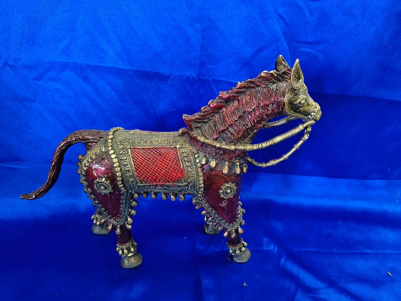 Handcrafted decorative metal horse figurine with ethnic detailing