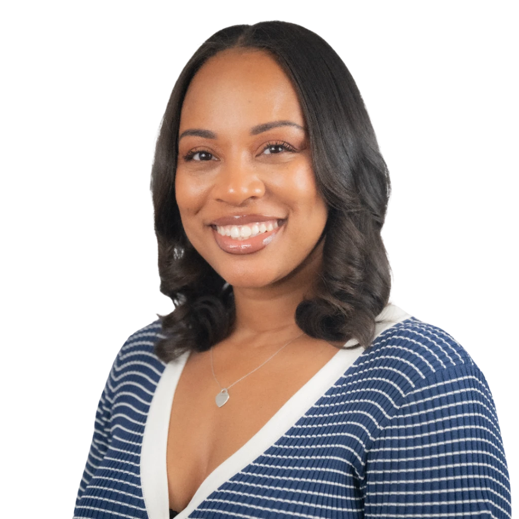 Woman with dark hair smiling, wearing a blue and white striped top.