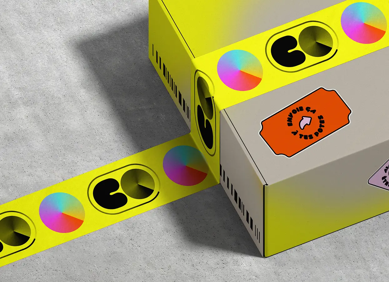 Colorful box packaging decorated with a COLORS illustrated sticker.