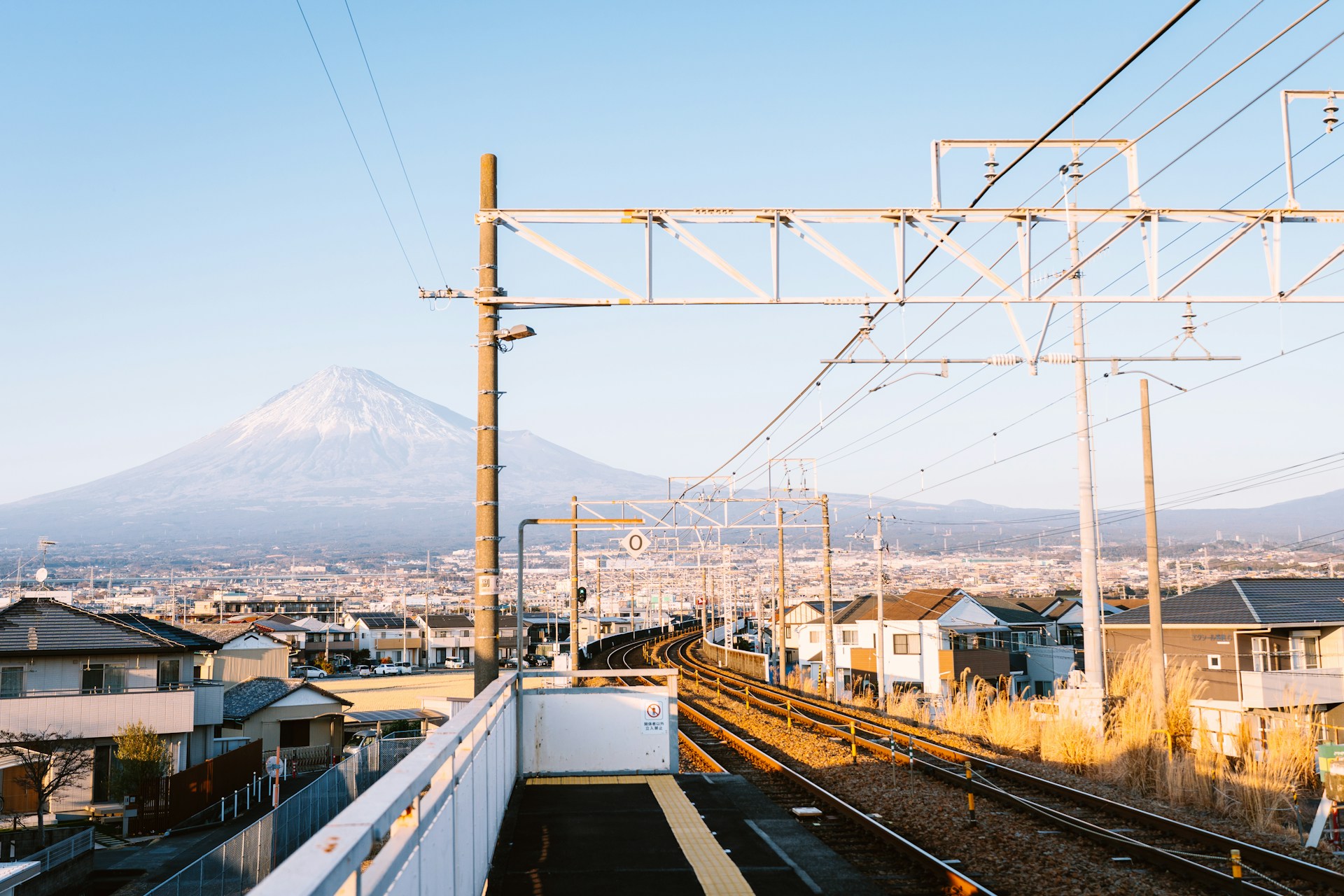 Towns in Japan have both fields and the sea.