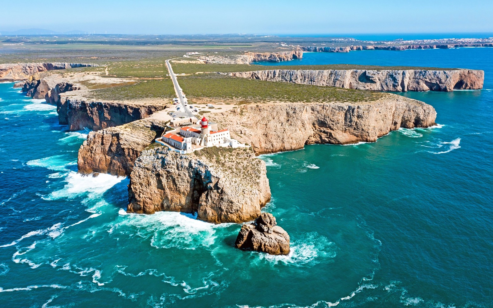 Lighthouse on cliffs at Cape St. Vincent, Western Algarve, Portugal.