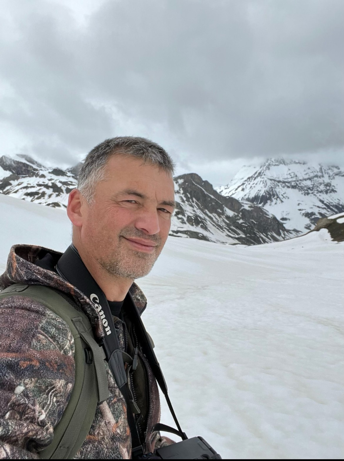 a blurry photo of a person standing in front of a wall