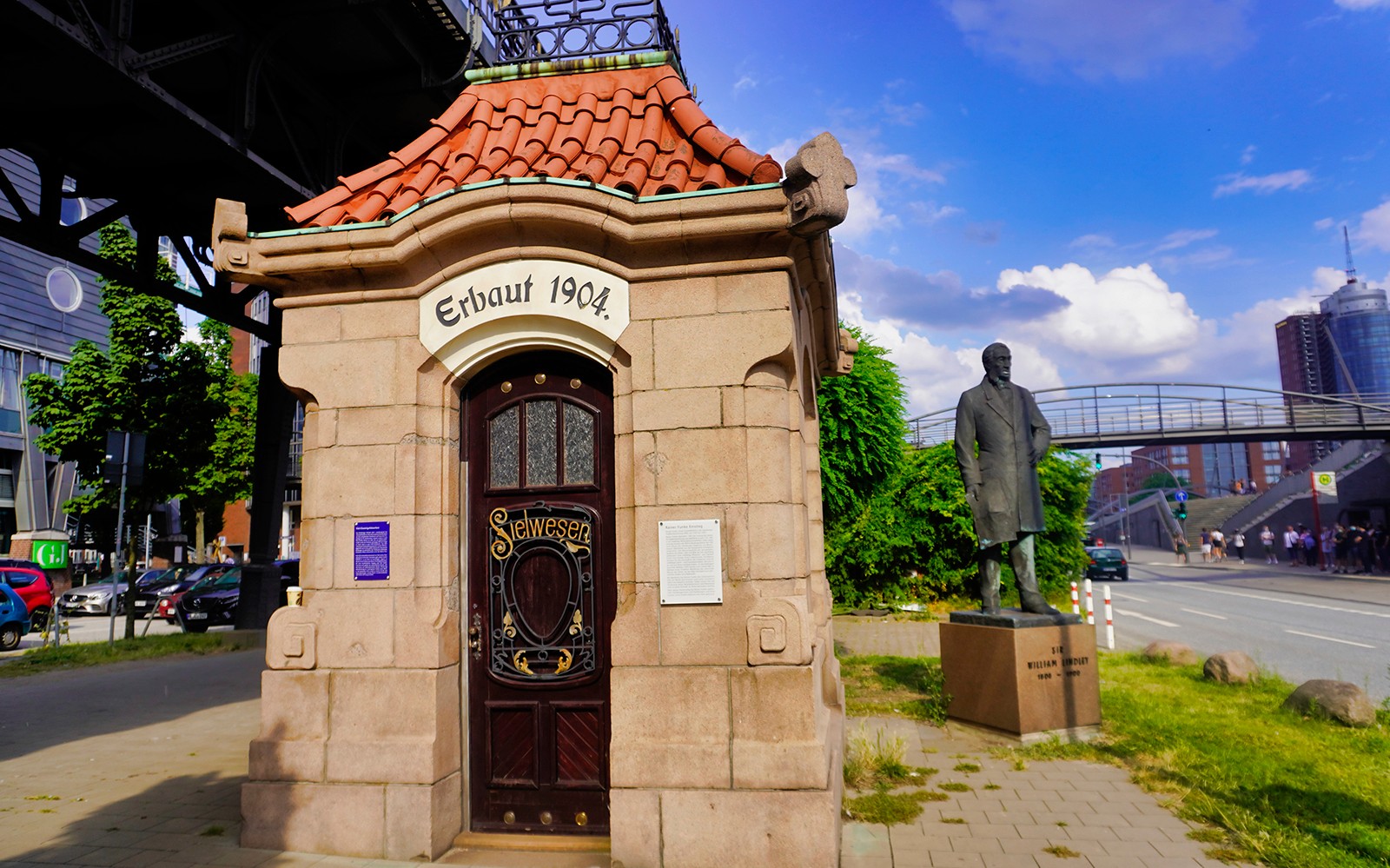 Historic building and statue of Sir William Lindley in Hamburg, Germany.