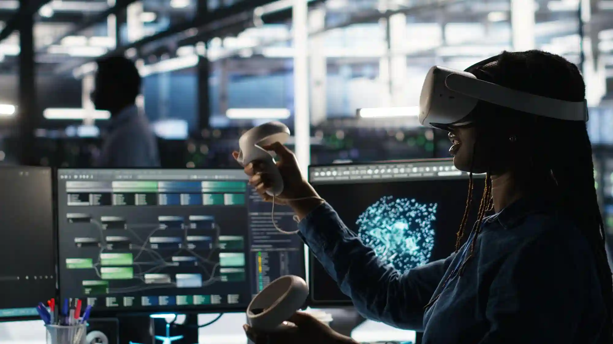A professional woman using VR goggles and controllers to visualize complex data structures in a dark, futuristic workspace.