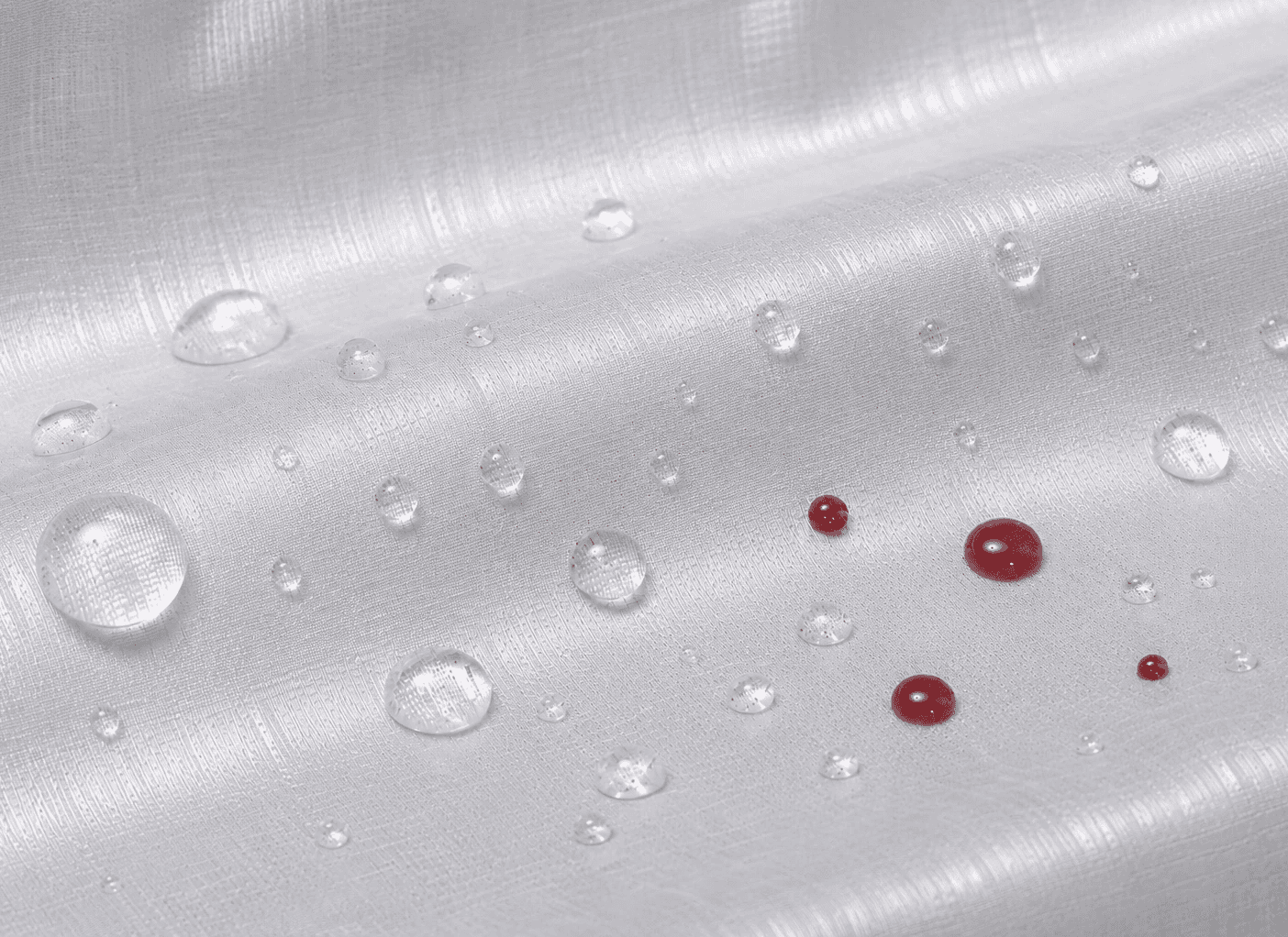 Dyneema composite resisting blod, urin and water