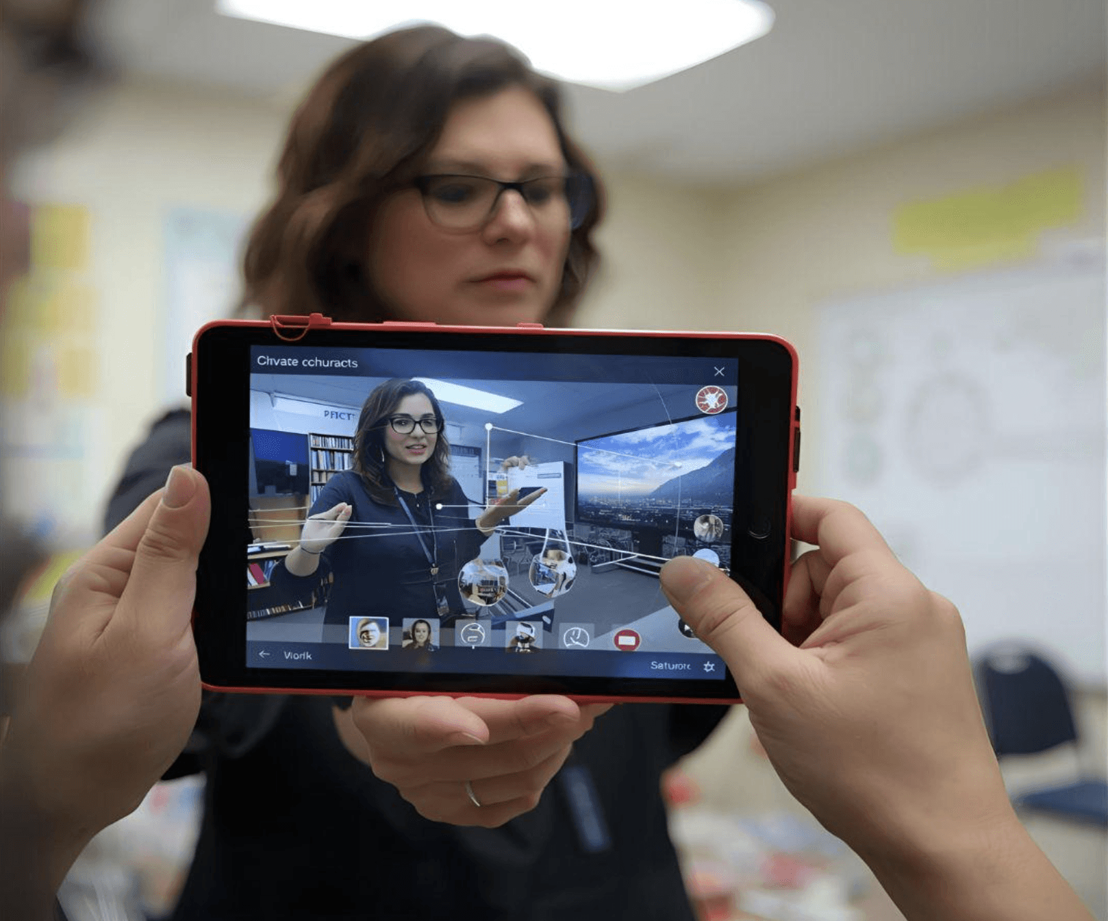 A teacher demonstrates an augmented reality lesson using a tablet, displaying an interactive 3D model in a classroom setting. The scene reflects how accessible AR applications allow teachers and students to create, explore, and collaborate with digital content, transforming abstract concepts into engaging, real-world learning experiences.