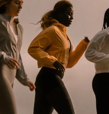 Woman running with friends