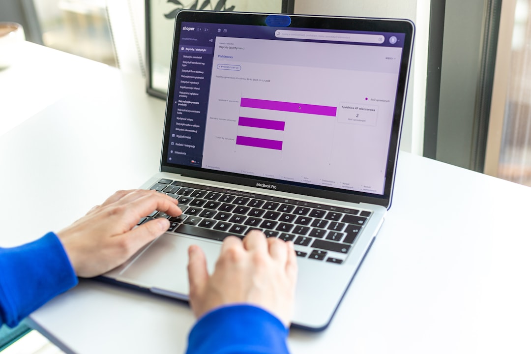A business owner selecting a Shopify developer on a computer screen