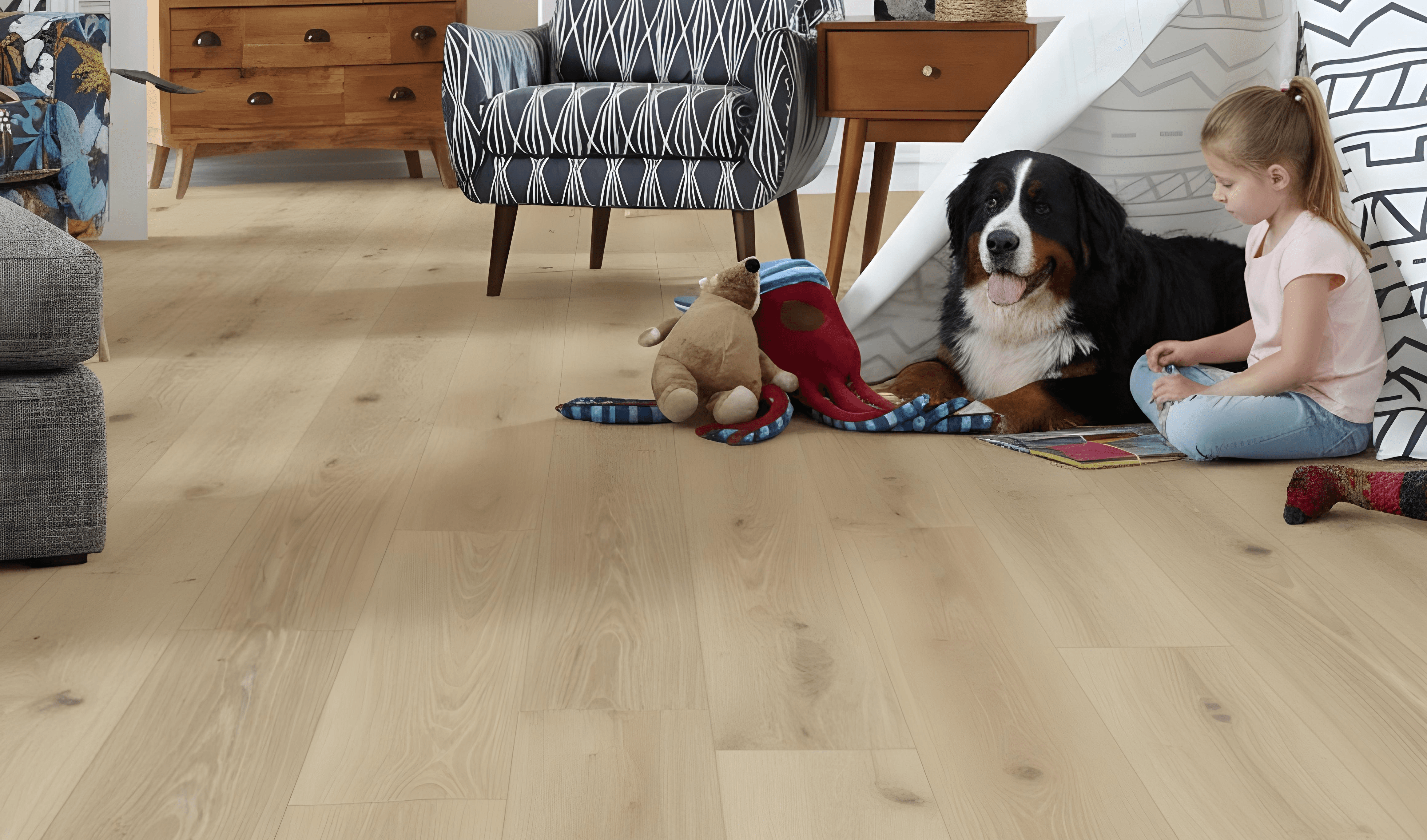 A young girl playing with her dog on light oak hybrid flooring, showcasing LUXO Floors’ scratch-resistant, pet-friendly, and family-safe hybrid surface ideal for modern Australian homes.