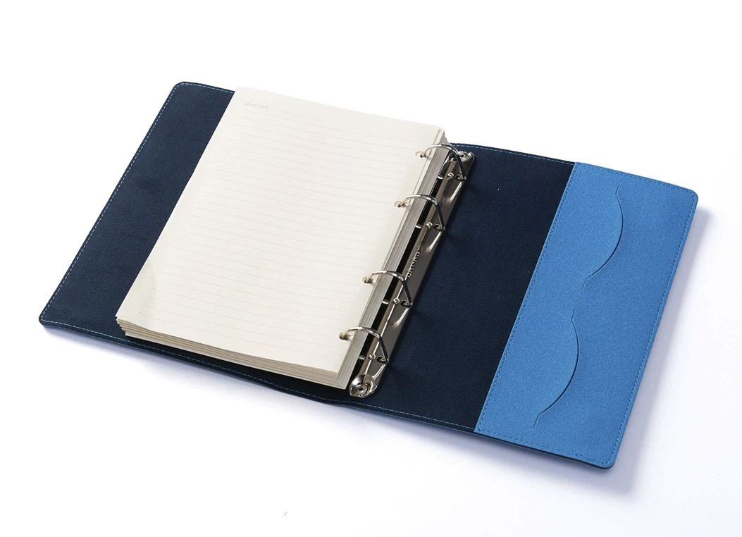 Open ring binder journal with lined ivory pages and metal rings