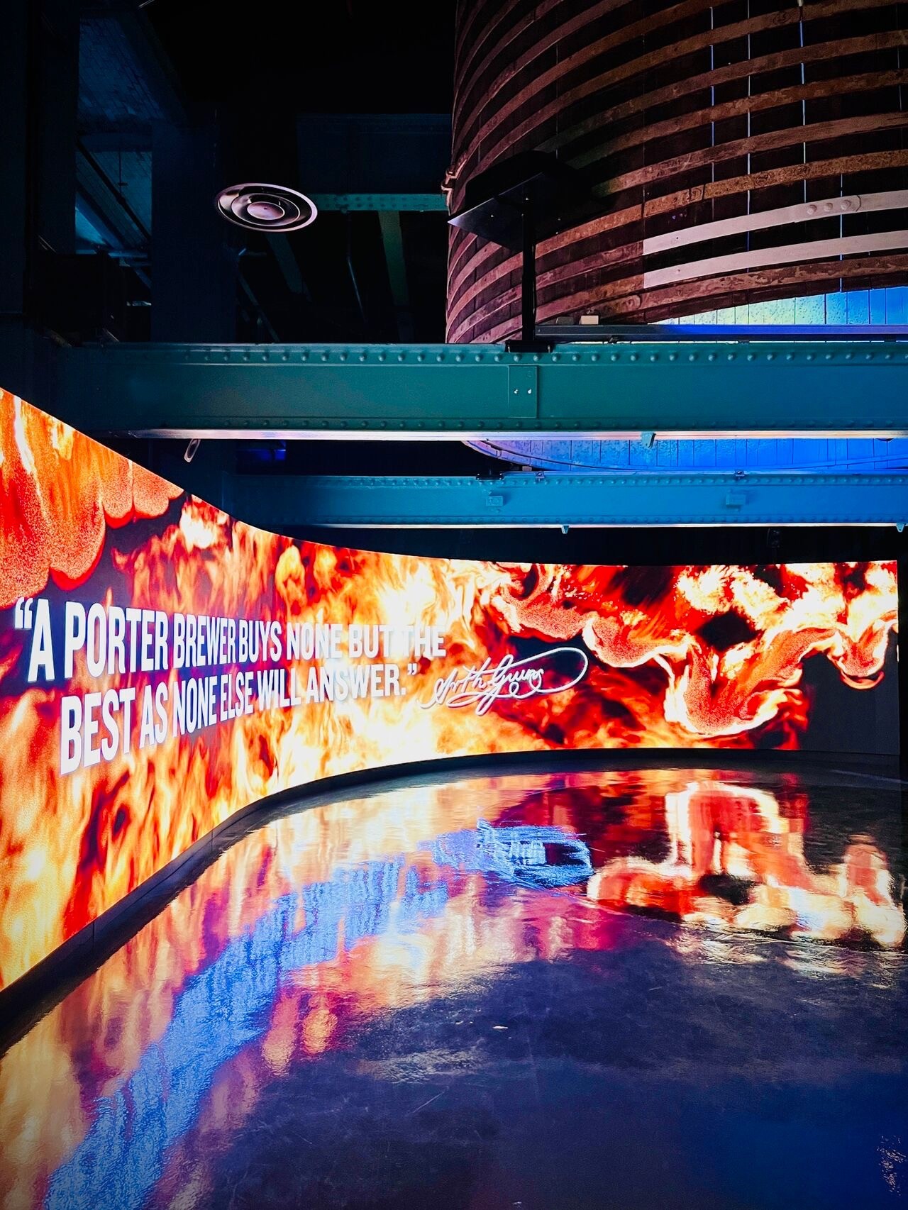 Blurred silhouette of a person against streaking orange city light trails at night