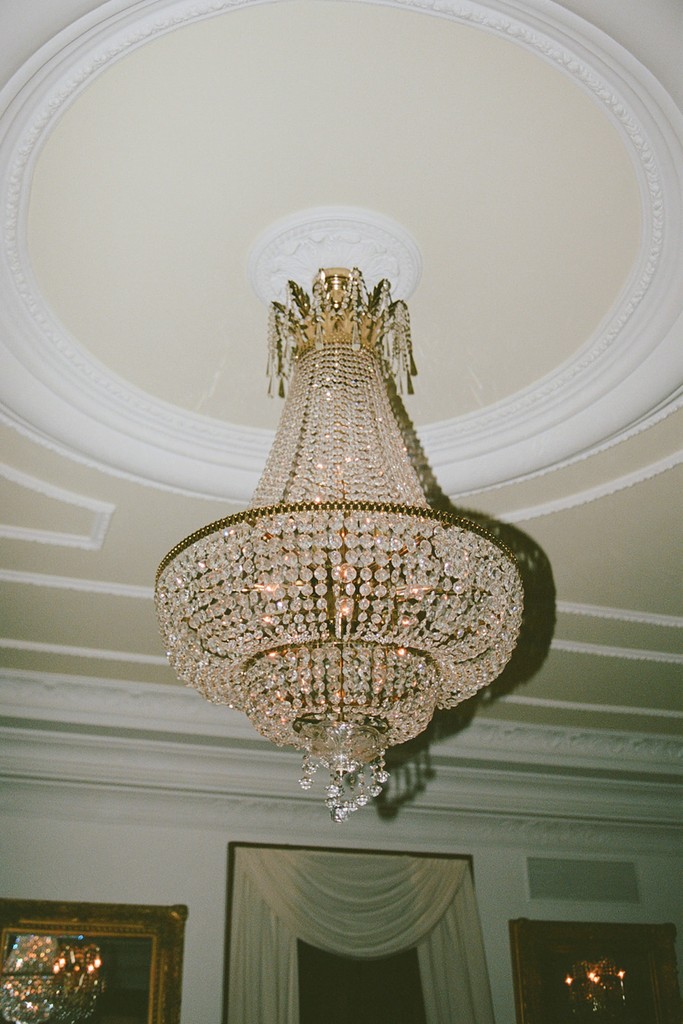 Crystal chandelier hanging in a classic ballroom