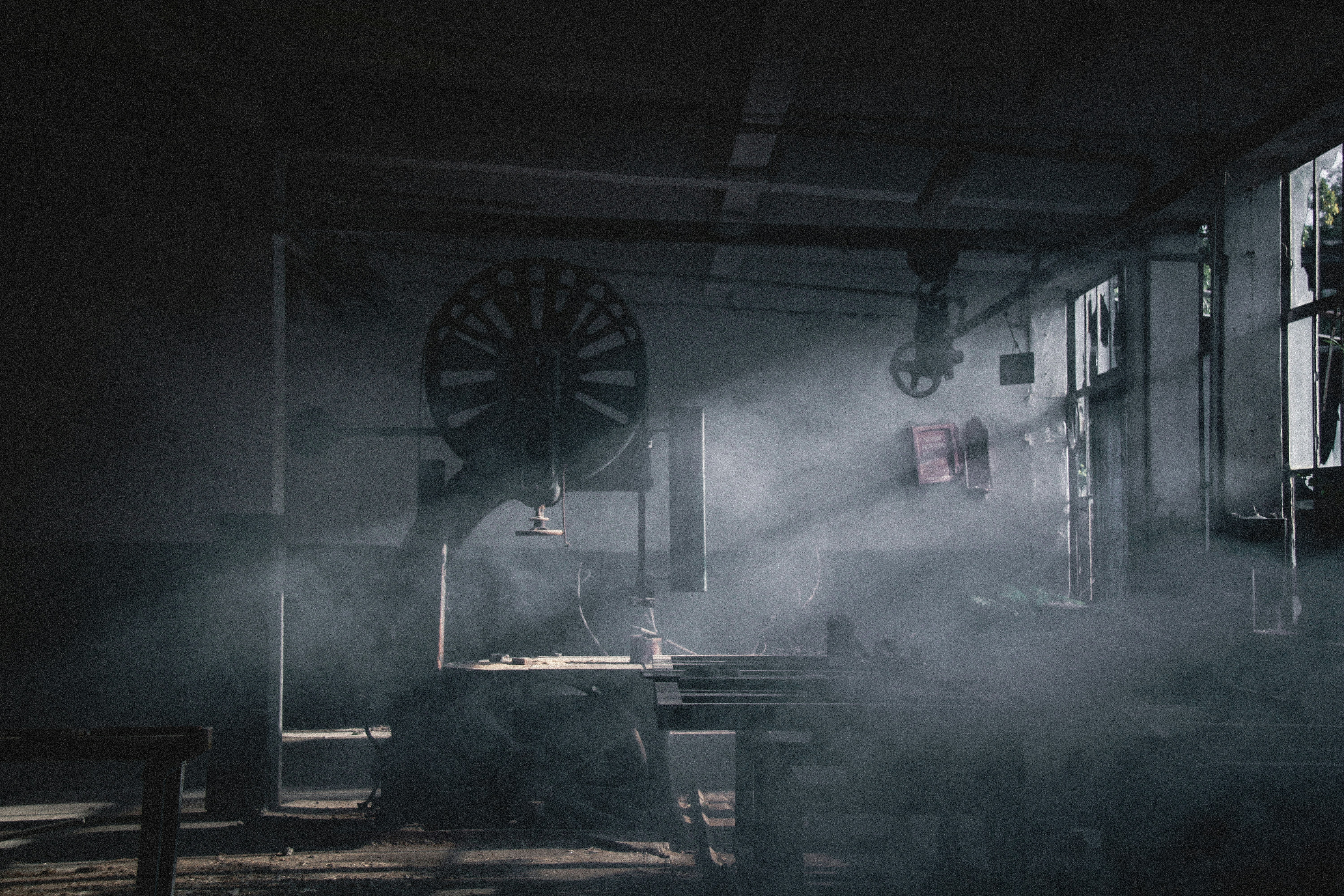 a large factory with smoke