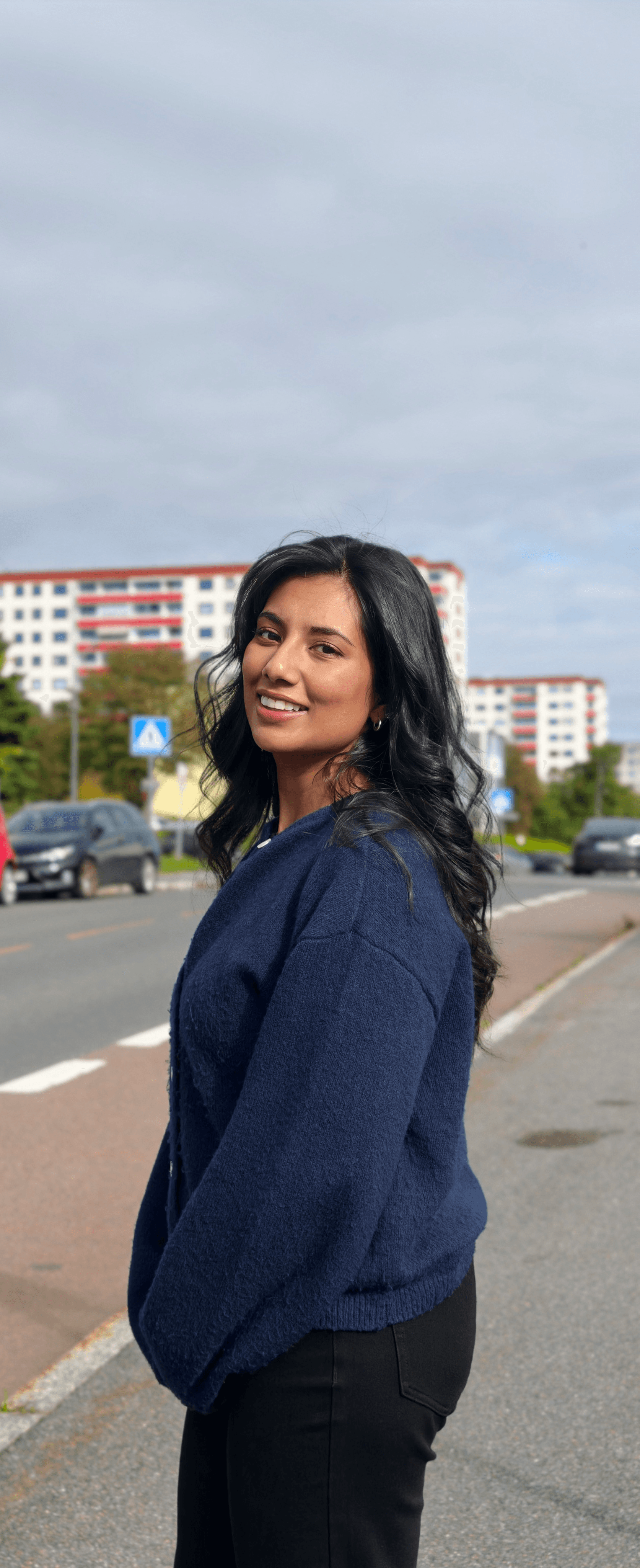 Cheerful dreamy woman with bob hairstyle